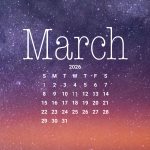 The Milky Way spans the night sky above a bright orange-yellow airglow that blankets the city lights along the east coast of Africa, from Kenya to Somalia.