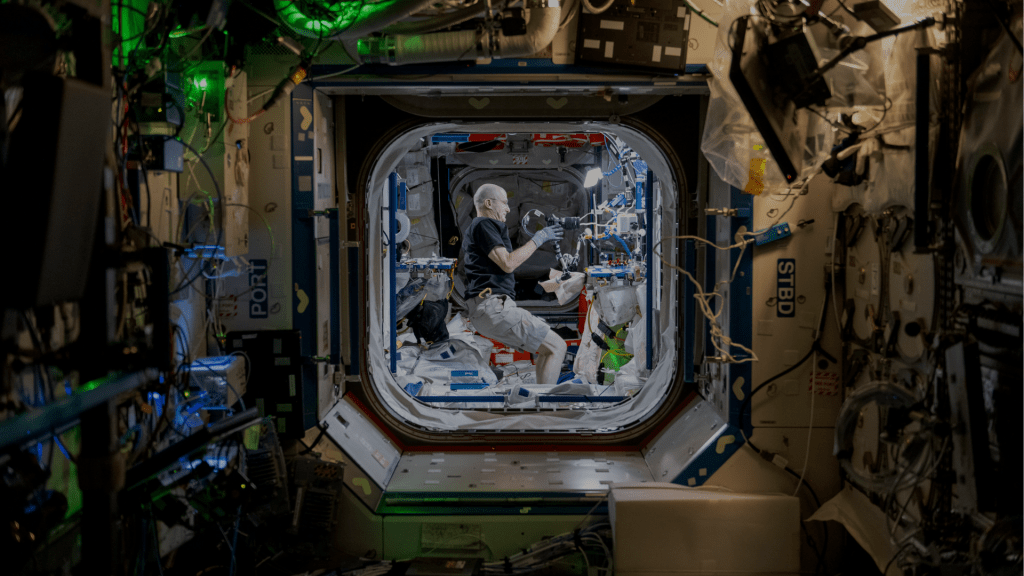 Pictured above, NASA astronaut Don Pettit is preparing the freezer with a polarizing filter to create colorful ice crystal wafers. This experiment examined the differences in how water freezes in microgravity compared to on Earth.