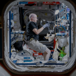 Pictured above, NASA astronaut Don Pettit is preparing the freezer with a polarizing filter to create colorful ice crystal wafers. This experiment examined the differences in how water freezes in microgravity compared to on Earth.