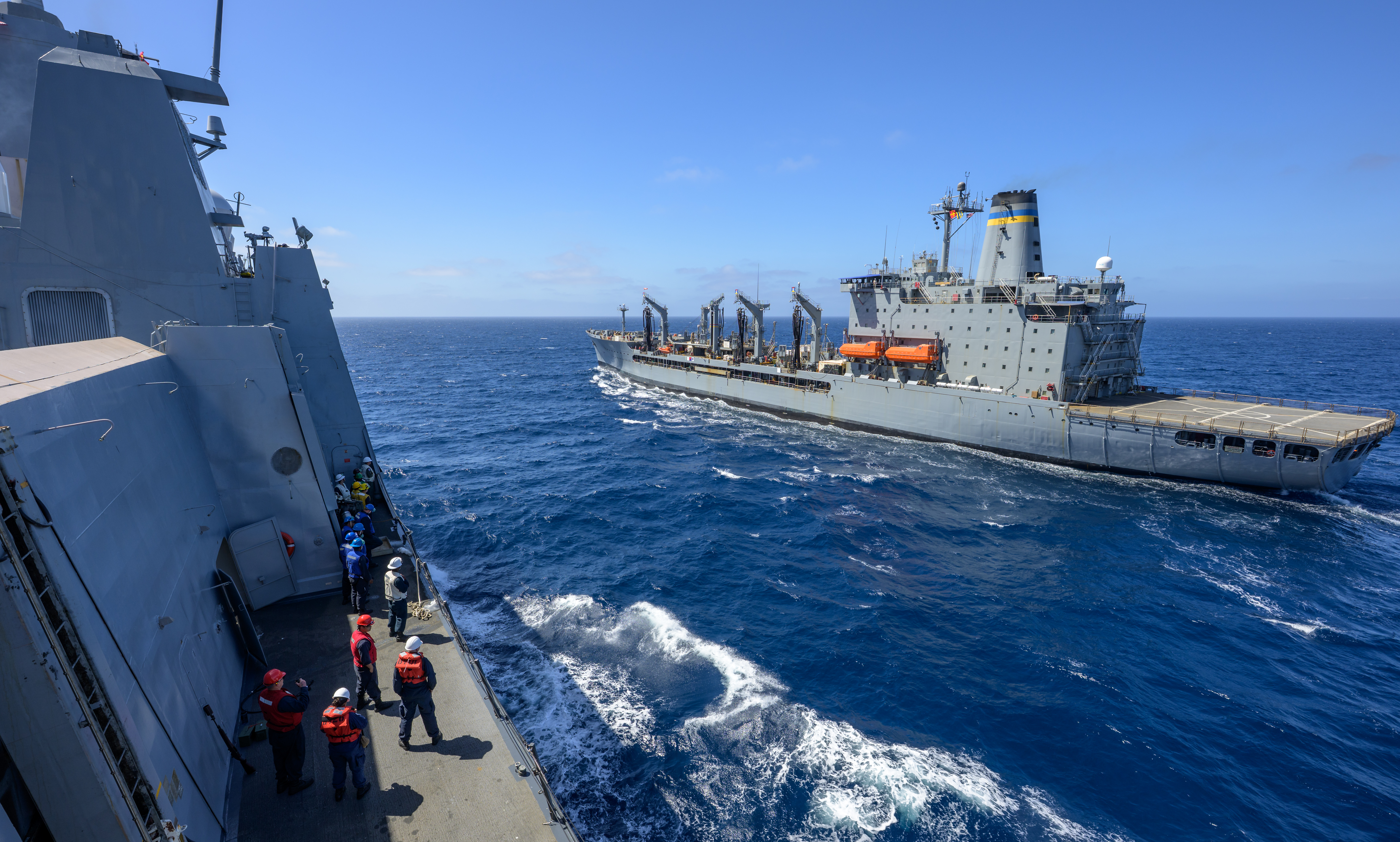 The USNS Guadalupe (T-AO 200) replenishment oiler prepares to refuel USS John P. Murtha (LPD 26) as NASA, U.S. Navy,...