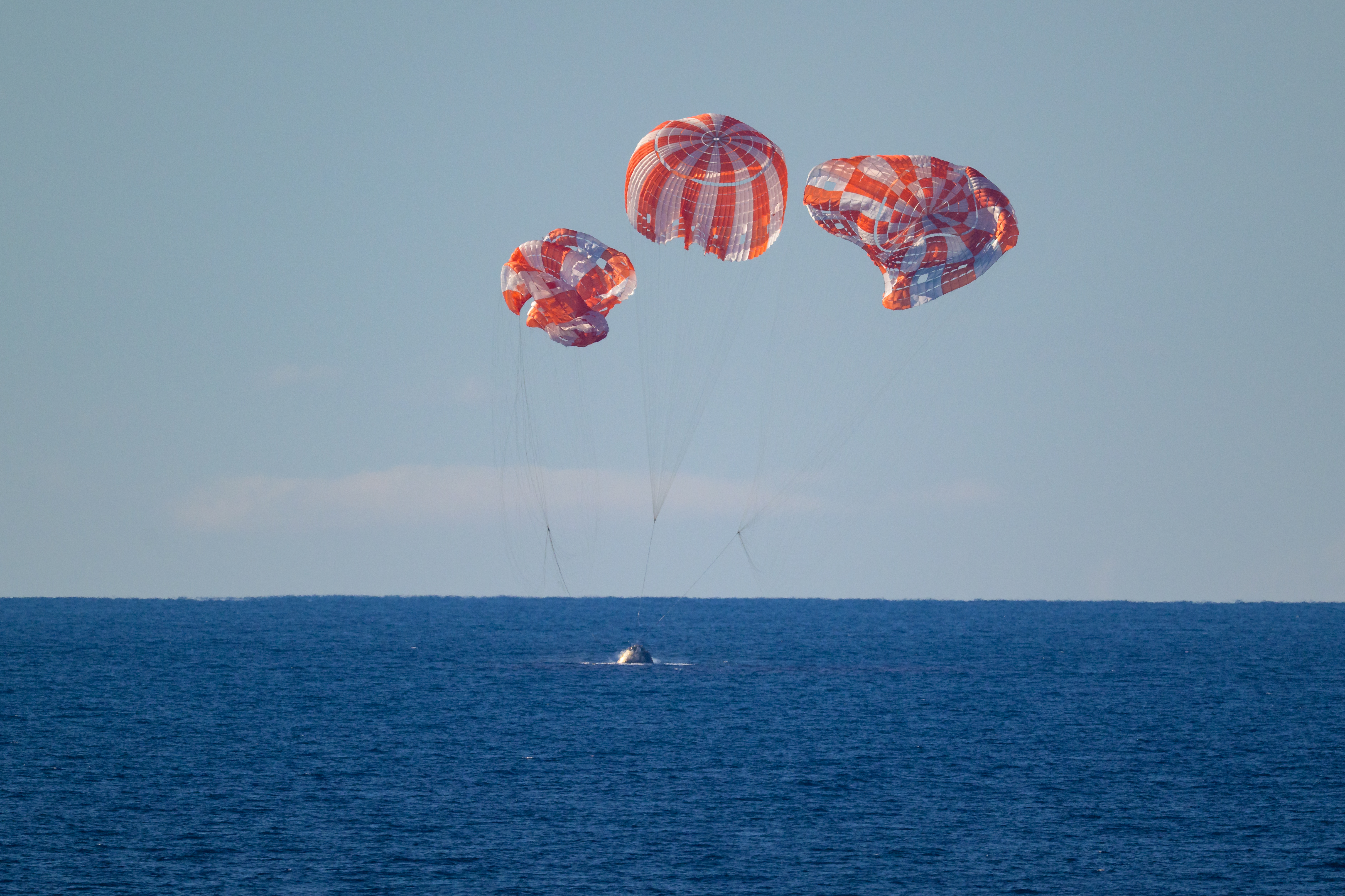 NASA’s Orion spacecraft with Artemis II crewmembers NASA astronauts Reid Wiseman, commander; Victor Glover, pilot; Christina Koch, mission specialist; and...