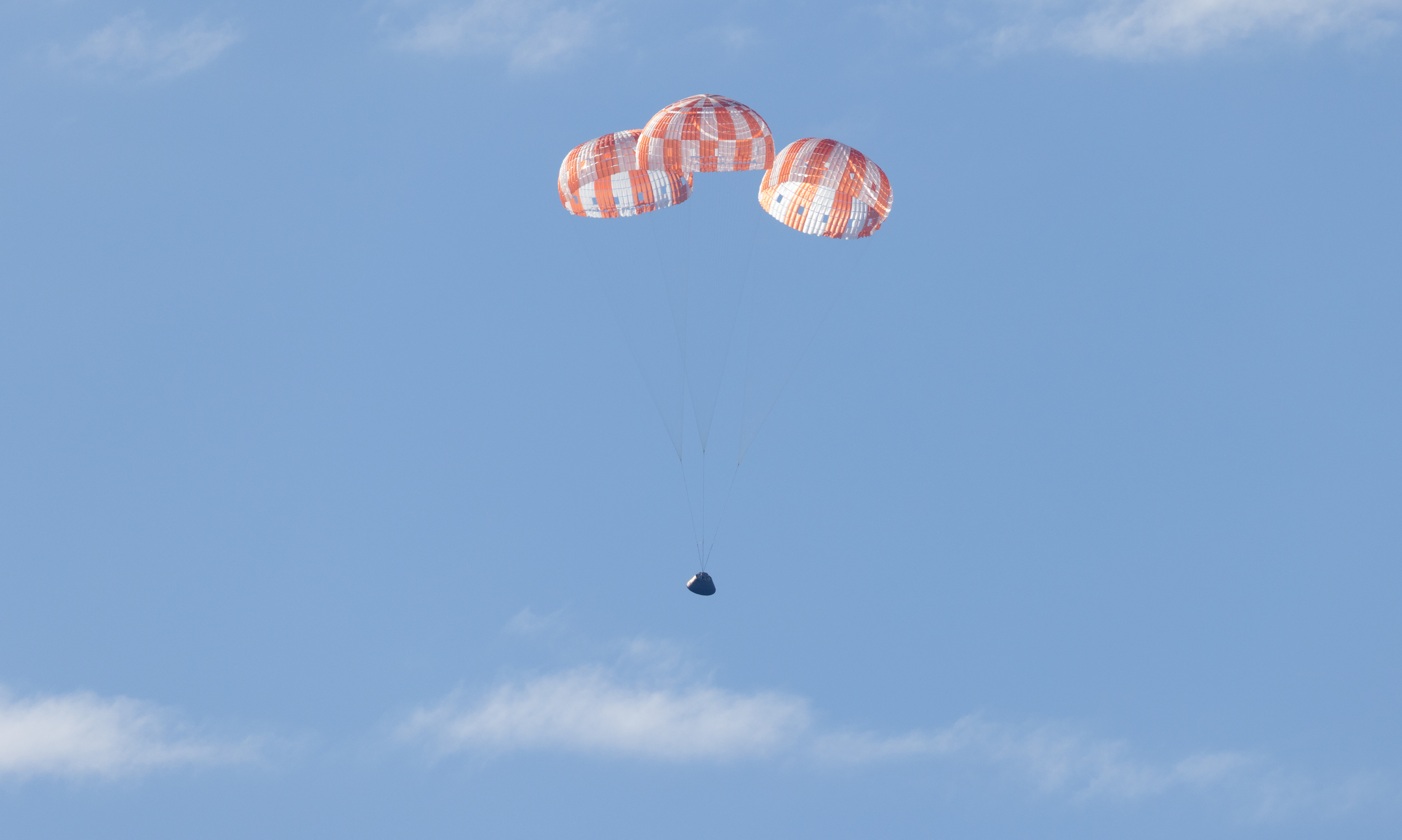 NASA’s Orion spacecraft with Artemis II crewmembers NASA astronauts Reid Wiseman, commander; Victor Glover, pilot; Christina Koch, mission specialist; and...
