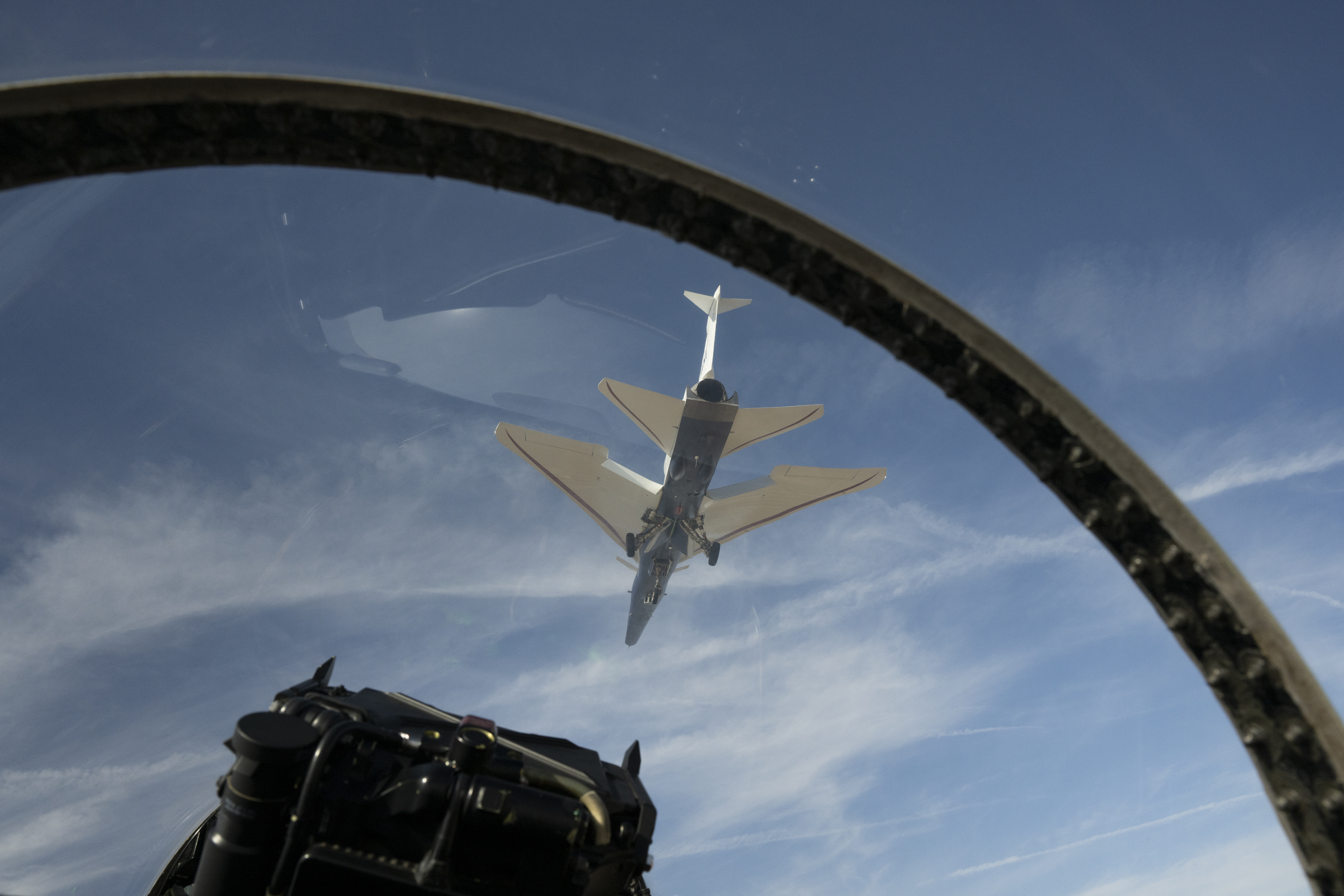 View from the Chase plane with the X-59 flying above it.