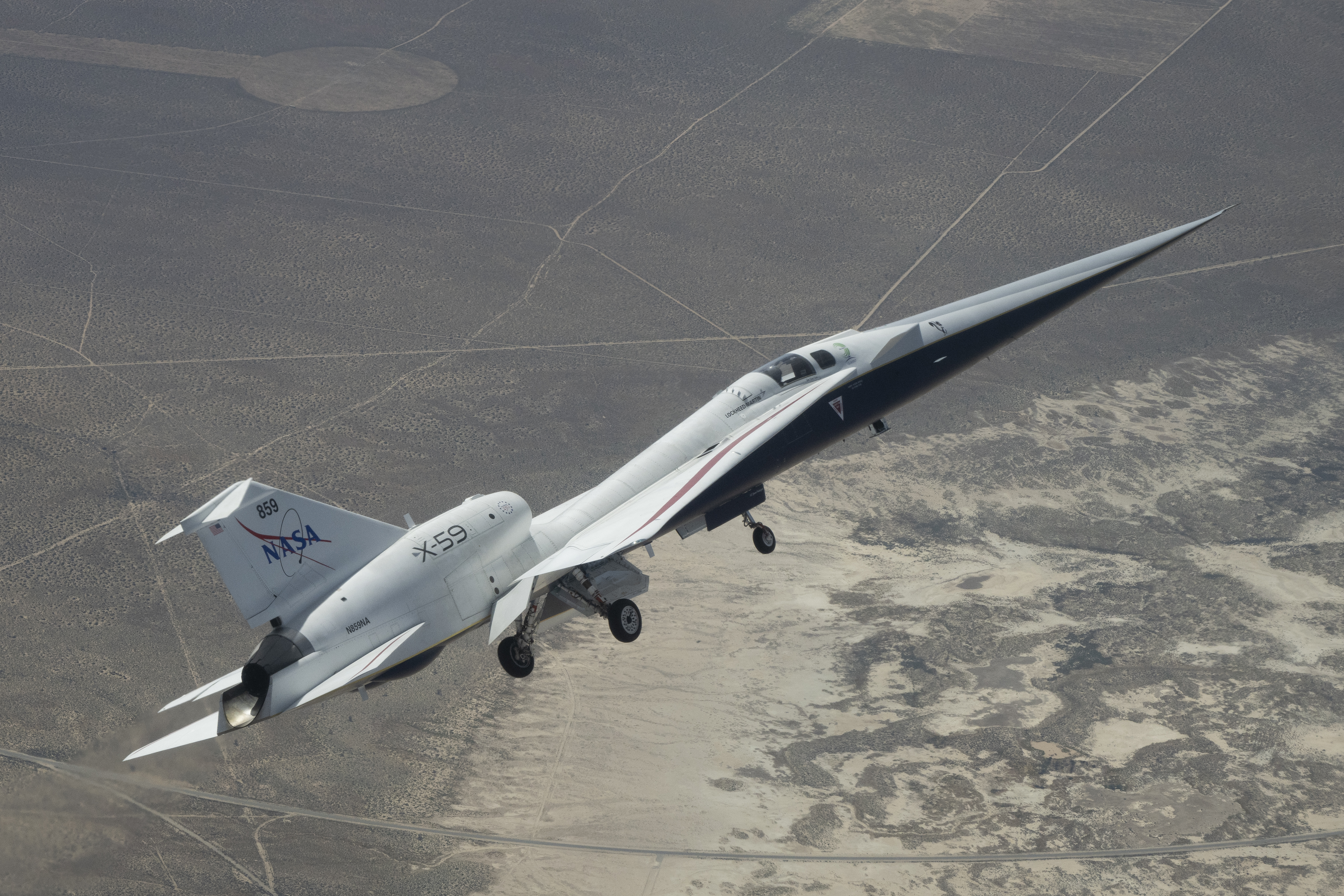 View of the X-59 veering left over the Mojave Desert.
