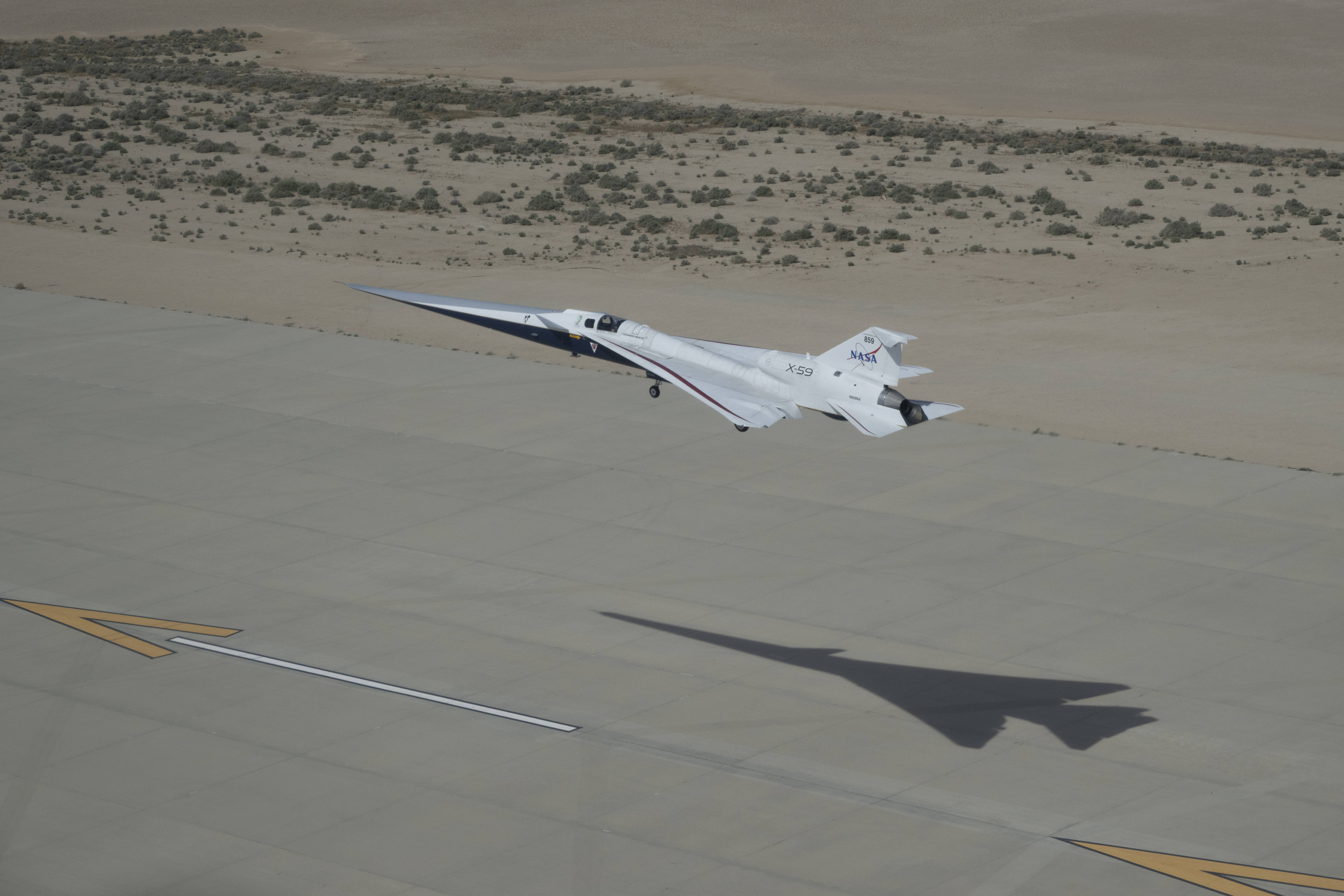 X-59 approaches landing on the runway.
