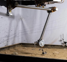 Robotic arm in a testing environment.