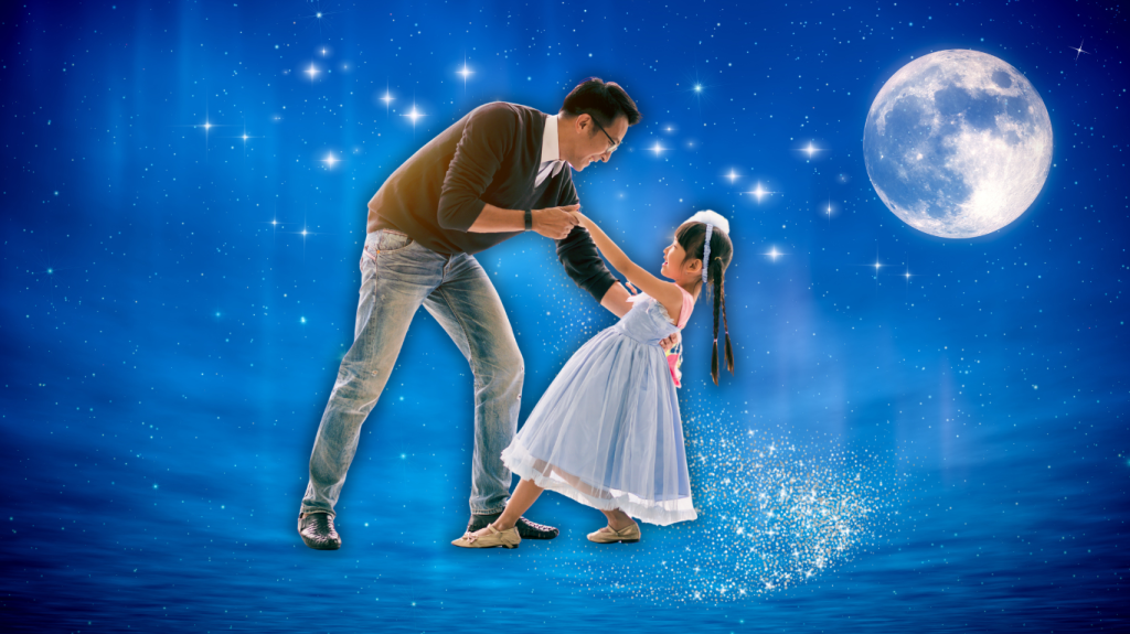 A father and young daughter dancing in front of a moonlit blue background.