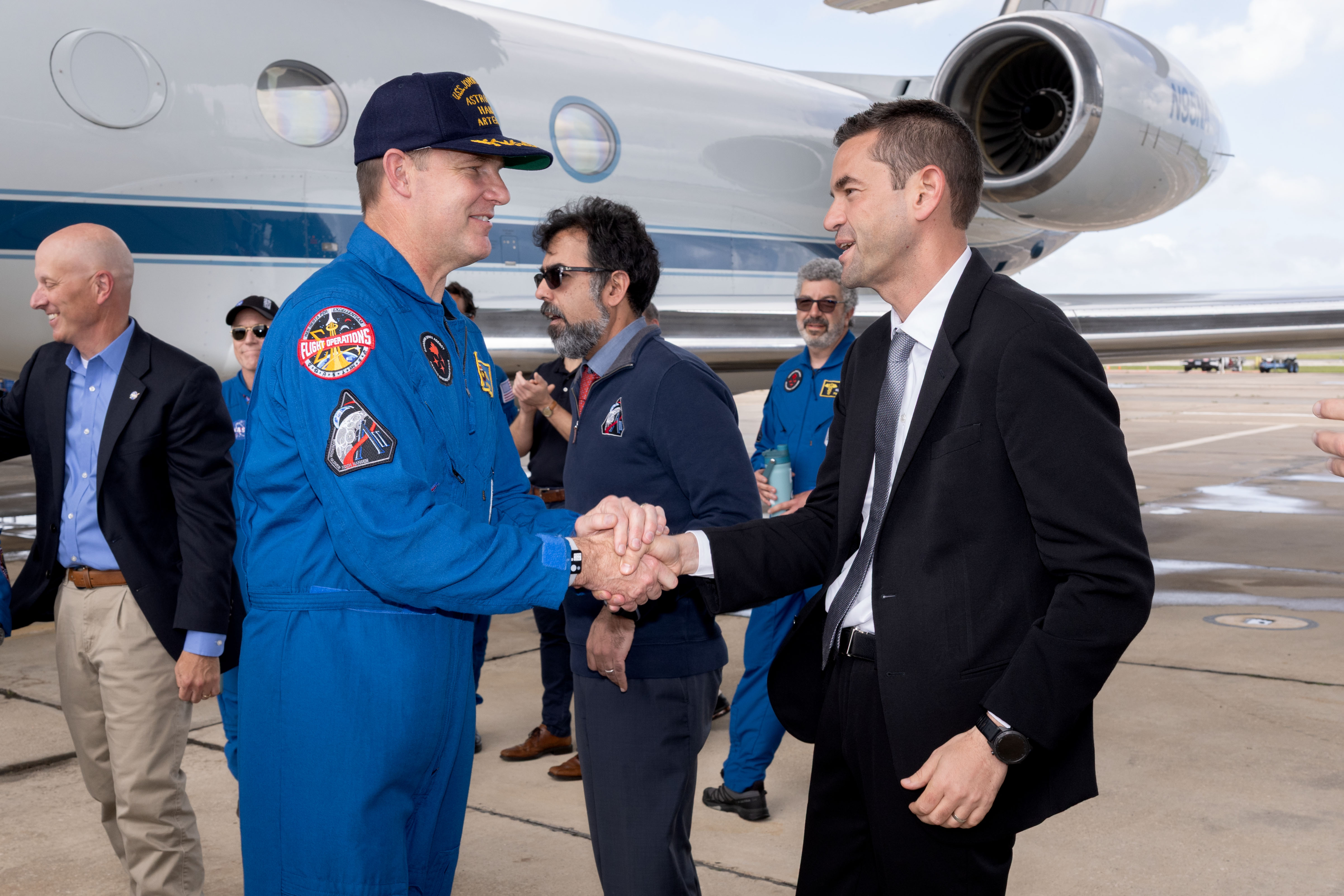 Date: April 11, 2026 Subject: Artemis-02 Crew Return Ceremony Location: Ellington Field Photo Credit: NASA/David DeHoyos