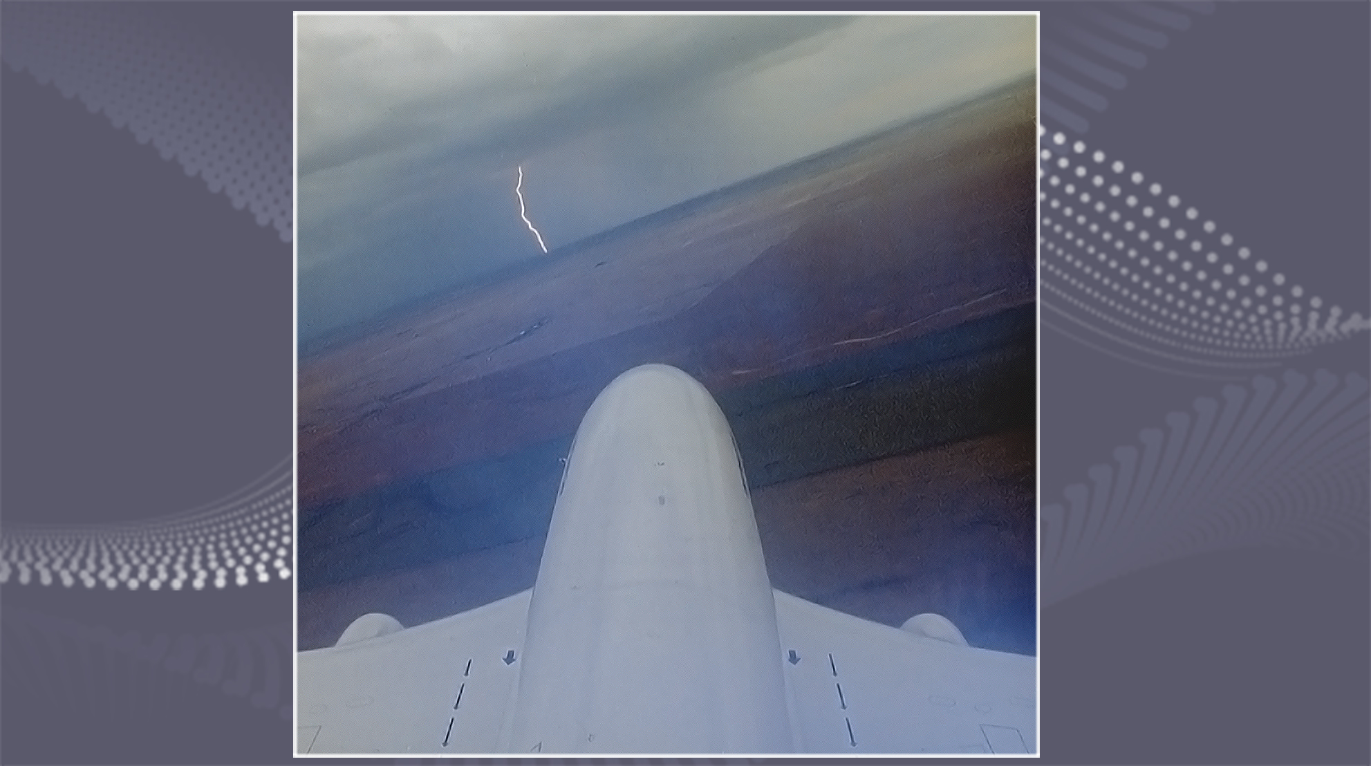 Boeing plane flying over water and a lighting strike can be seen in the distance.