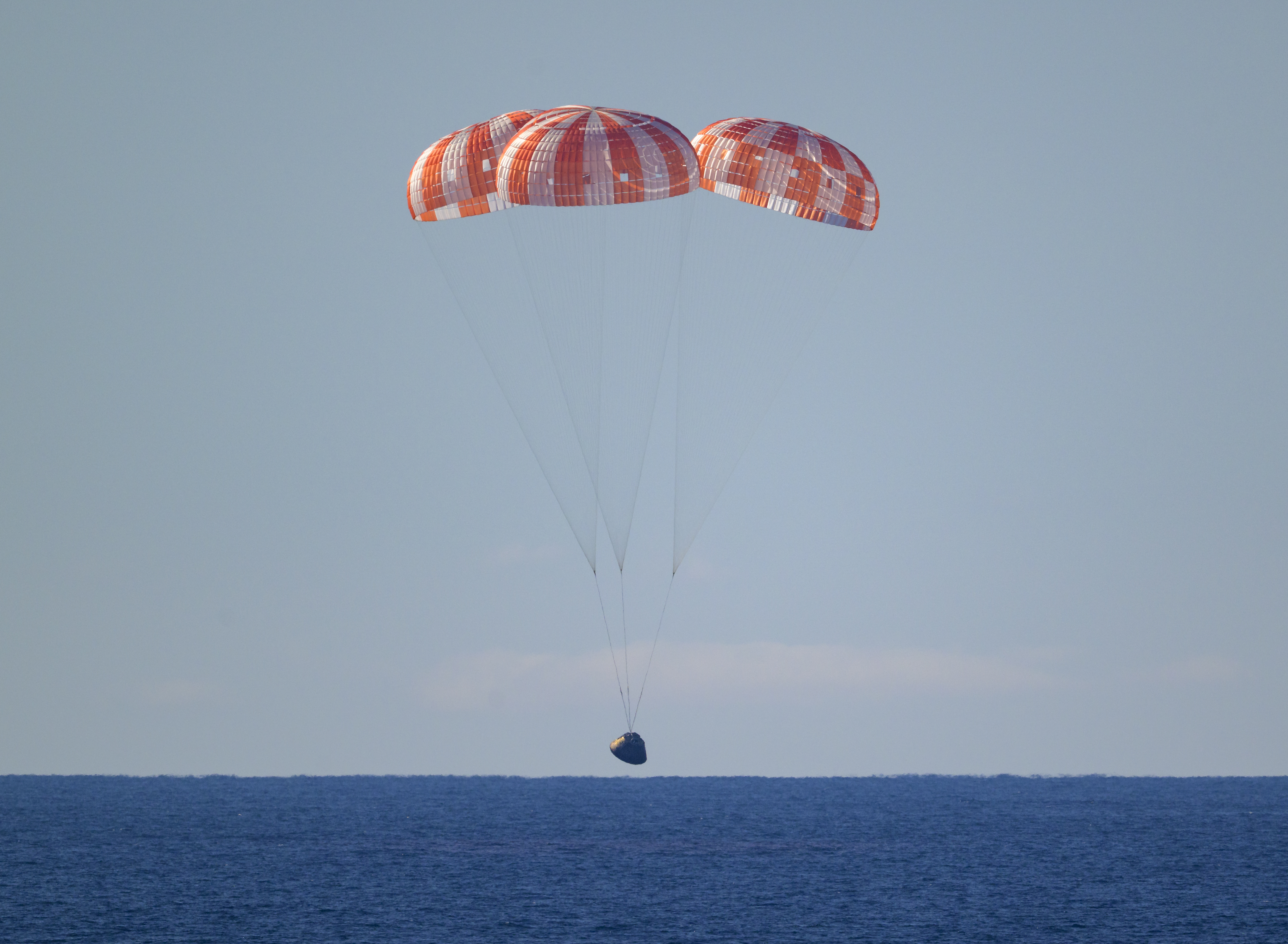 NASA’s Orion spacecraft with Artemis II crewmembers NASA astronauts Reid Wiseman, commander; Victor Glover, pilot; Christina Koch, mission specialist; and...