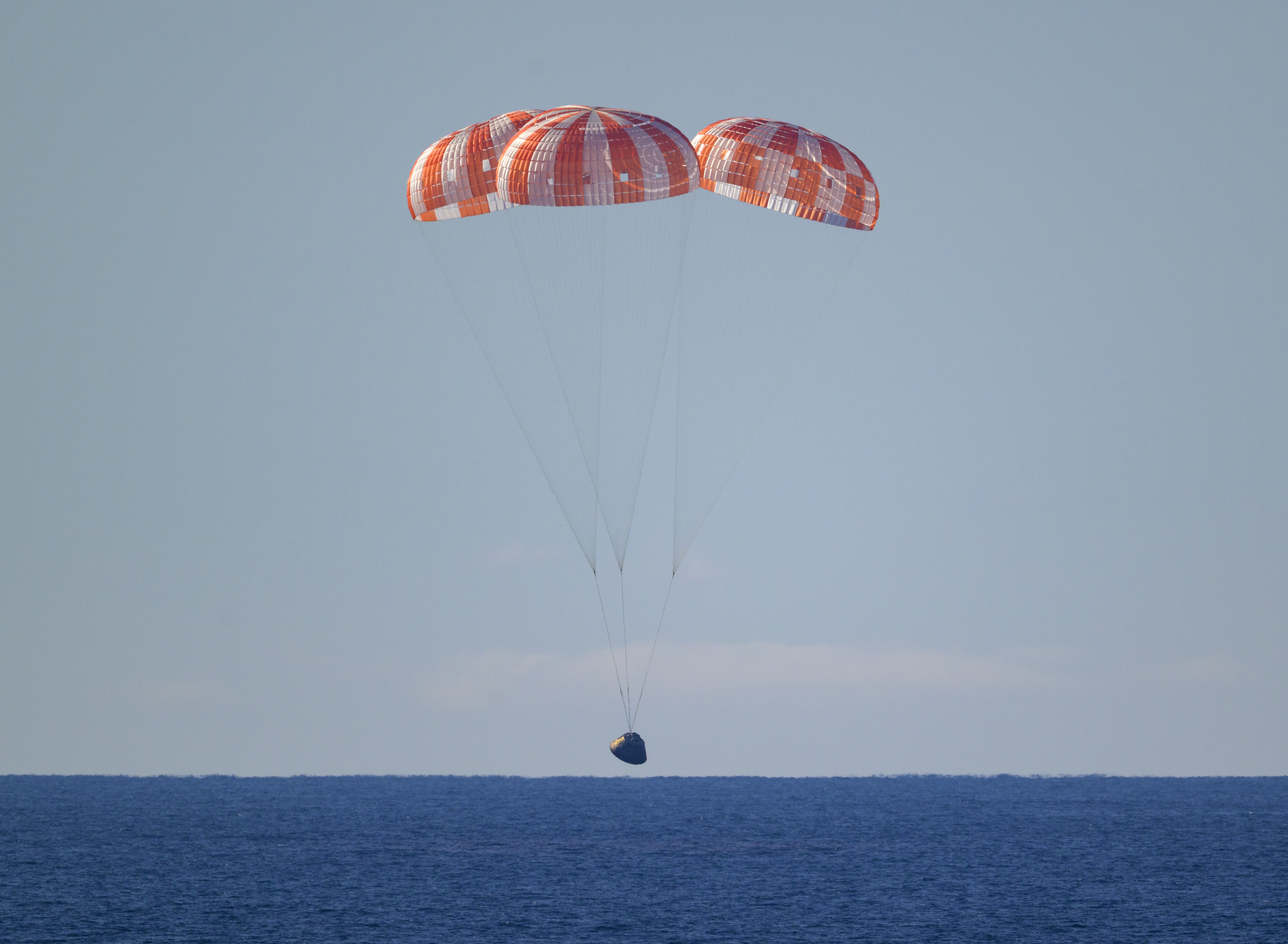 NASA’s Orion spacecraft with Artemis II crewmembers NASA astronauts Reid Wiseman, commander; Victor Glover, pilot; Christina Koch, mission specialist; and...