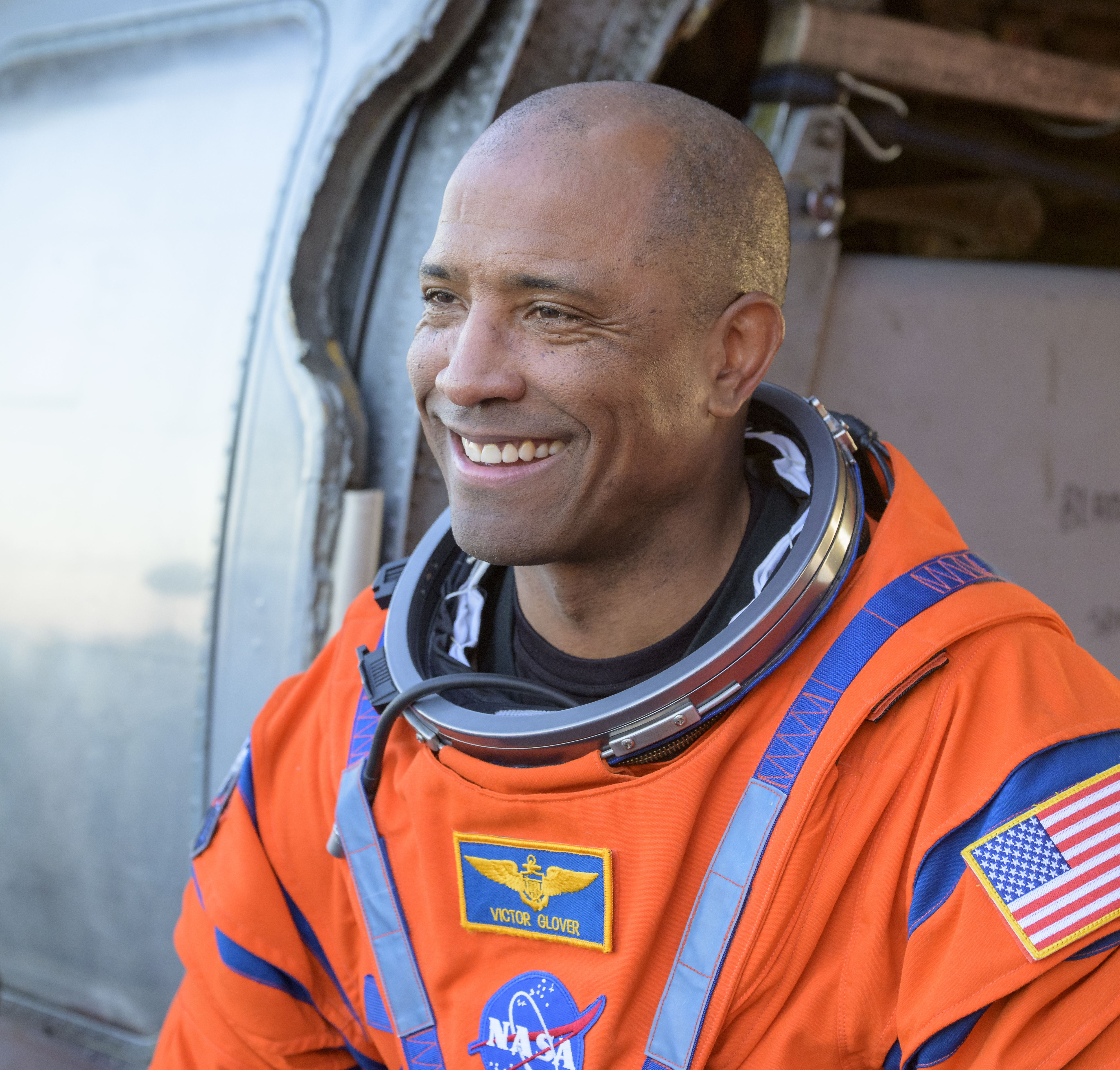 NASA astronaut Victor Glover, Artemis II pilot is seen sitting in a Navy MH-60 Seahawk from Helicopter Sea Combat Squadron...