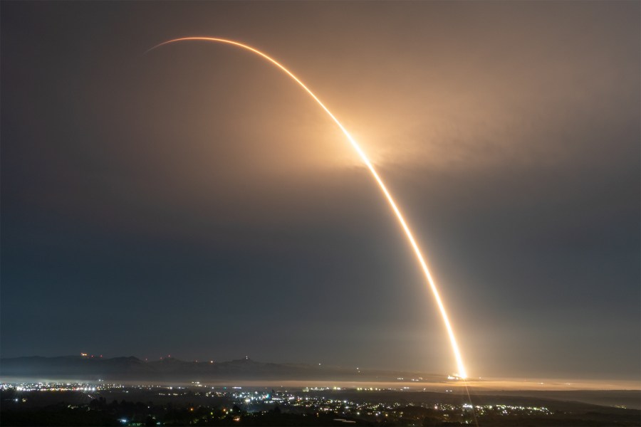 A long-exposure image of a rocket launch