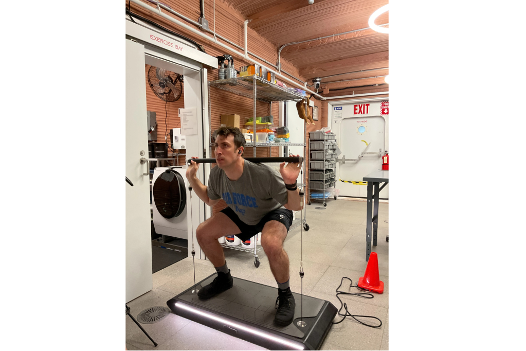 Crew Health and Performance Exploration Analog (CHAPEA) Mission 2 commander, Ross Elder, exercising in the habitat.