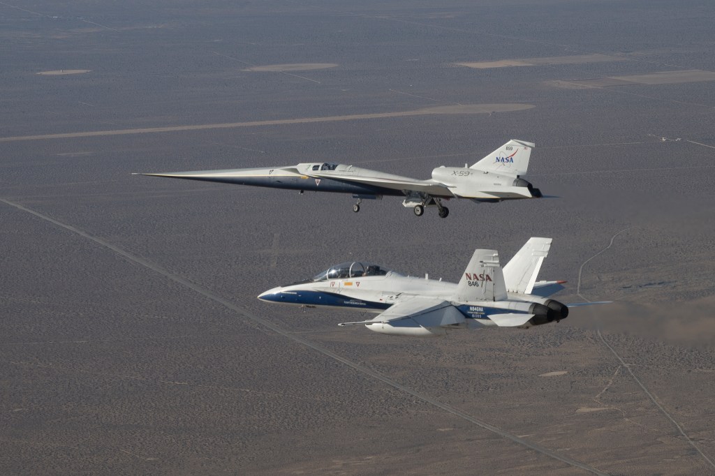 X-59 in flight with the F/A-18 aircraft.