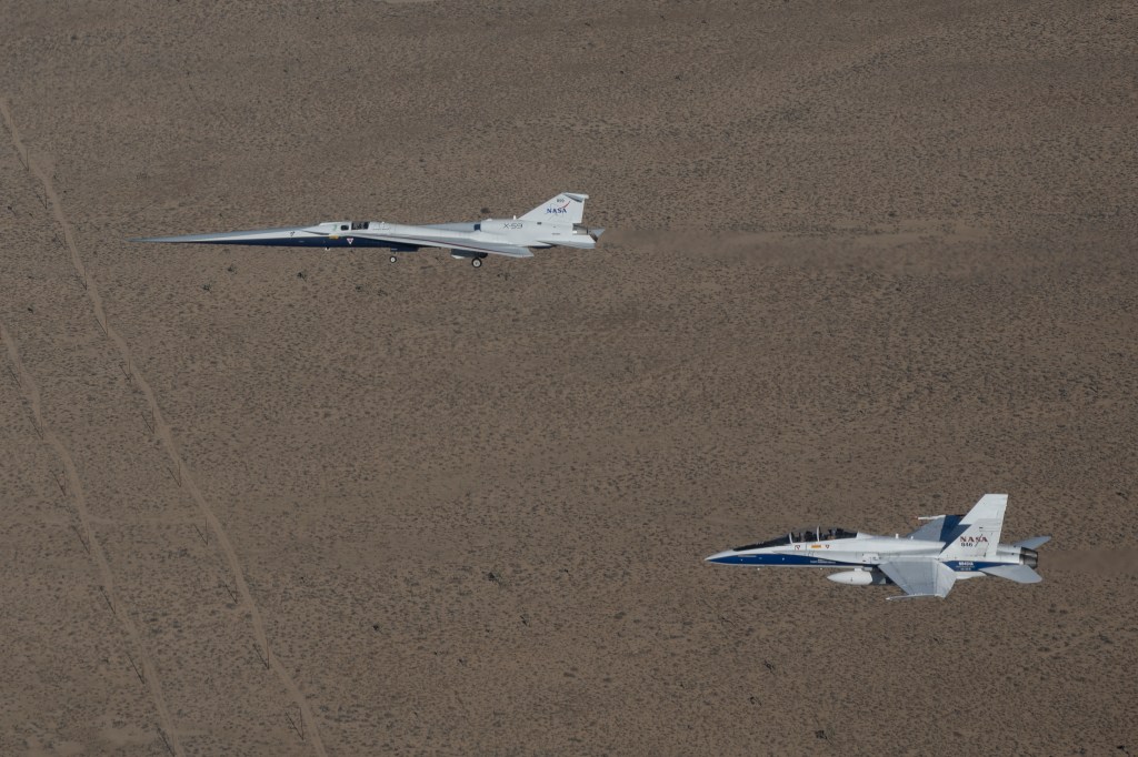 X-59 in flight with the F/A-18 aircraft.