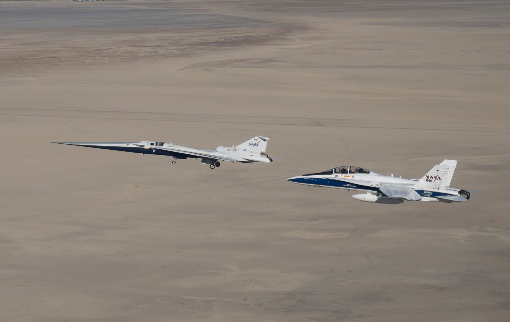 X-59 in flight with the F/A-18 aircraft.