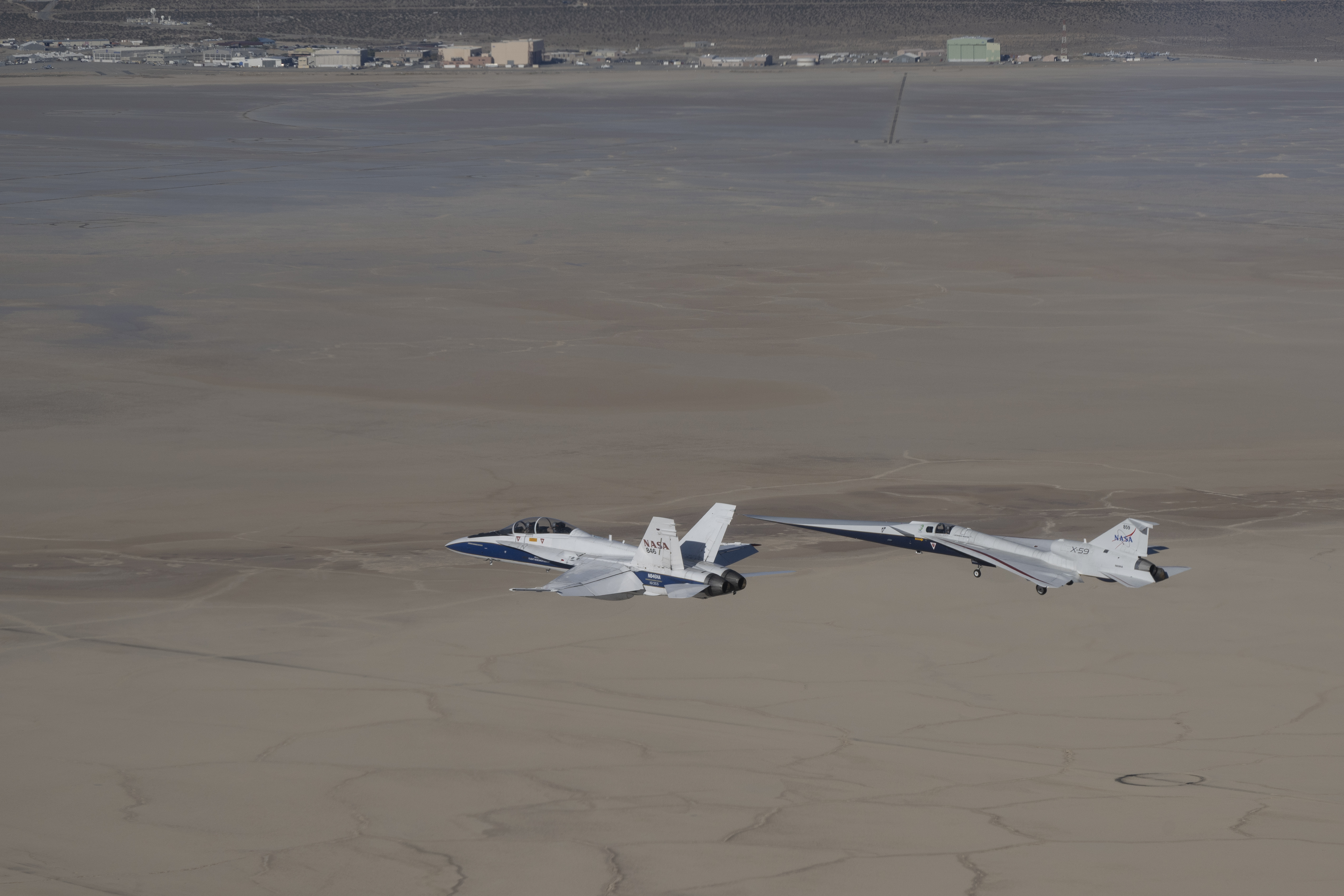 X-59 in flight with the F/A-18 aircraft.