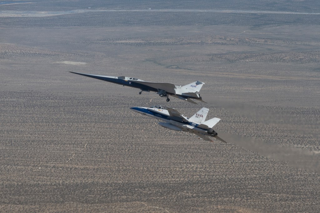 X-59 in flight with the F/A-18 aircraft.