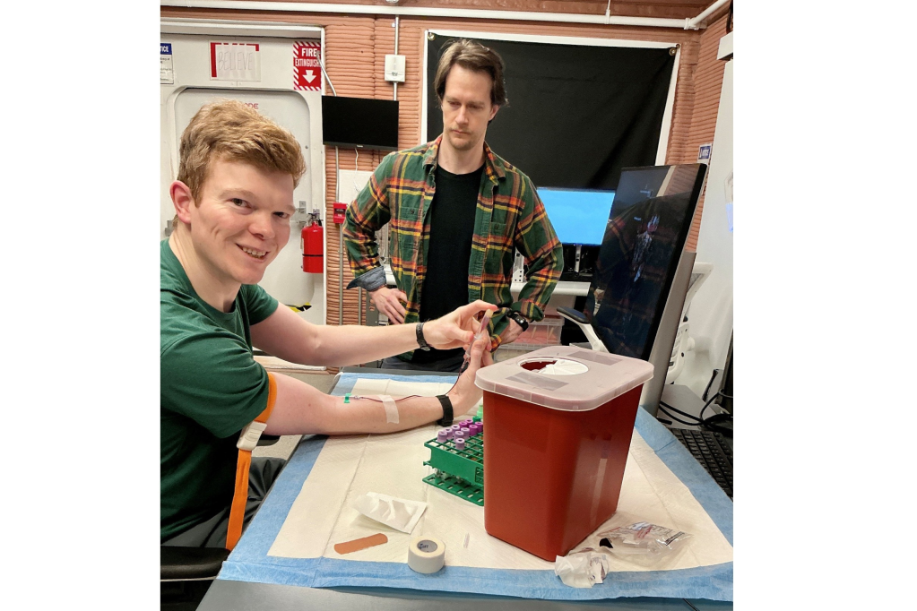 CHAPEA crew members perform blood collections to monitor their health. (From left: James Spicer and Matthew Montgomery)