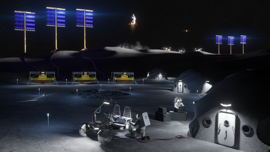 Artist’s rendering of a future base at the lunar South Pole. Multiple tall solar arrays provide power to habitats and surface systems spread across the landscape. Astronauts work near a lunar rover and equipment outside illuminated habitat structures while a lander descends in the distance.