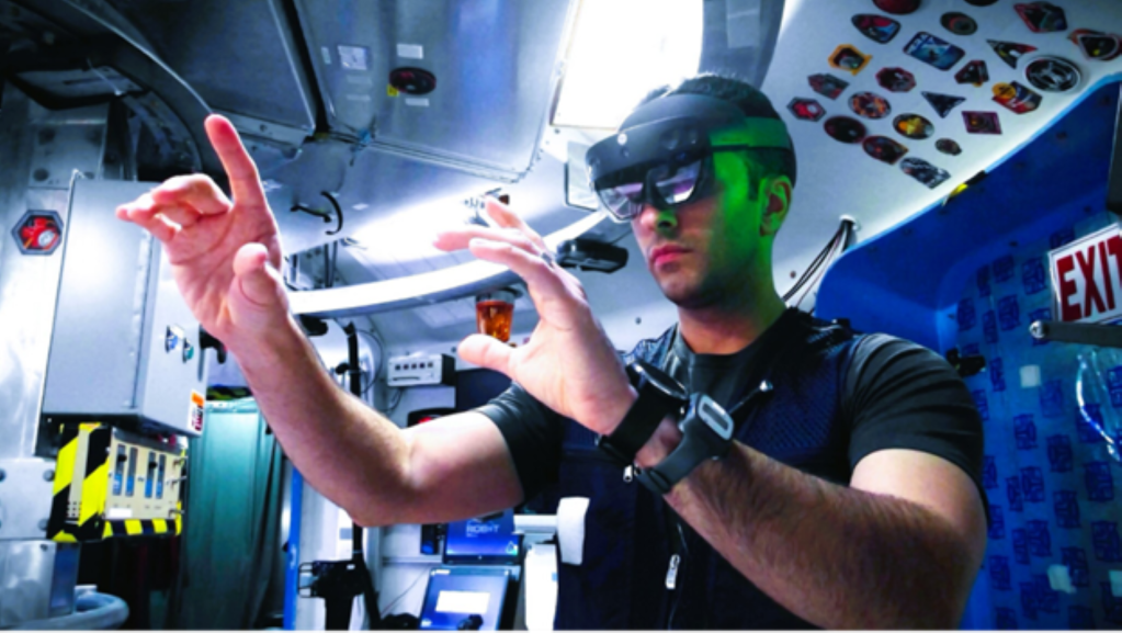 A research volunteer uses augmented reality goggles to perform astronaut-like tasks during a simulated space mission. Participants selected for NASA’s first Mars Exploration Analog mission also will perform tasks in immersive, interactive environments while living inside habitats that simulate traveling to and living on Mars.