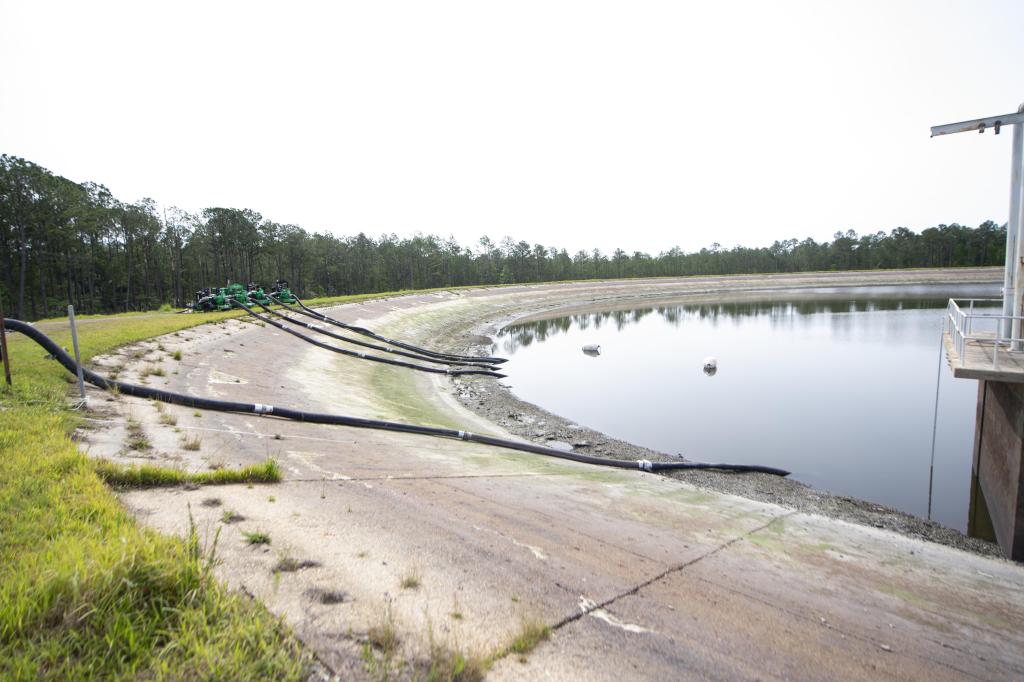 The reservoir on May 11 with roughly 40 million gallons removed, revealing a significantly lowered waterline as upgrades continue.