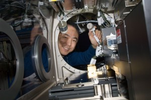 Japan Aerospace Exploration Agency astronaut Satoshi Furukawa, Expedition 29 flight engineer, works at the Microgravity Science Glovebox (MSG) in the Destiny laboratory of the International Space Station.