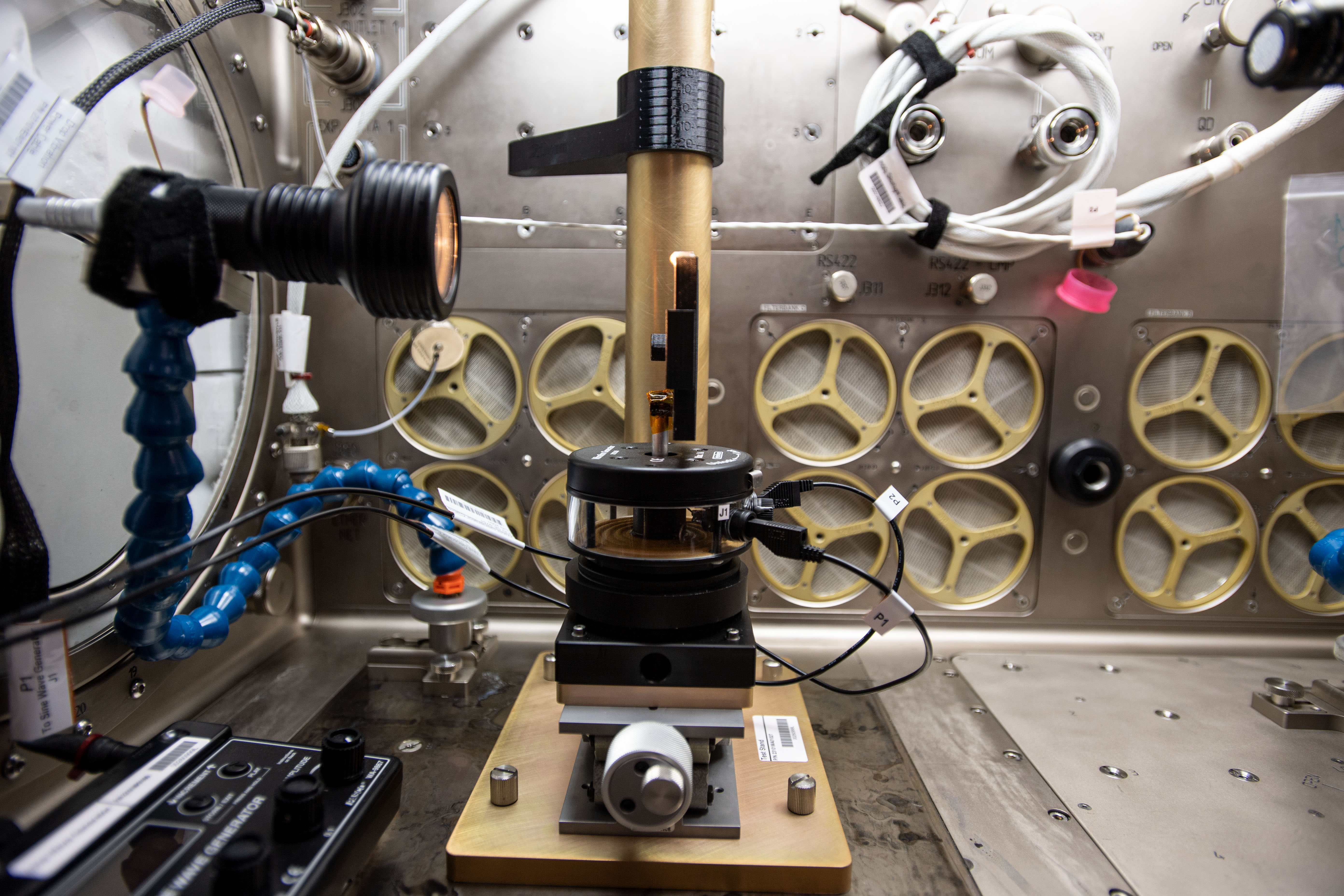An image of the Drop Vibration hardware inside the Microgravity Science Glovebox (MSG) aboard the International Space Station.