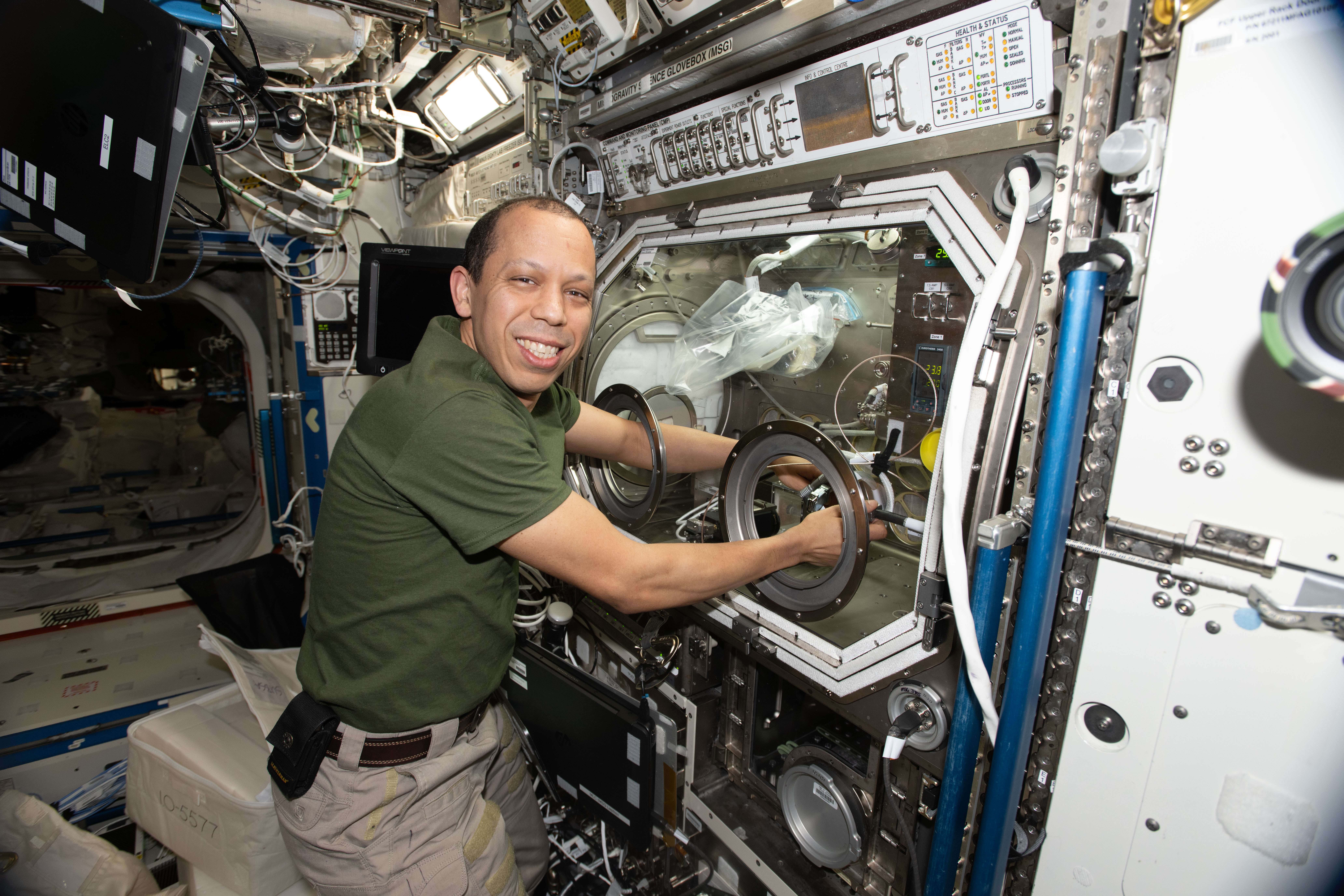 NASA astronaut Chris Williams replaces sample hardware inside the Microgravity Science Glovebox aboard the International Space Station to support semiconductor crystal investigation, SUBSA-InSPA-SISug.