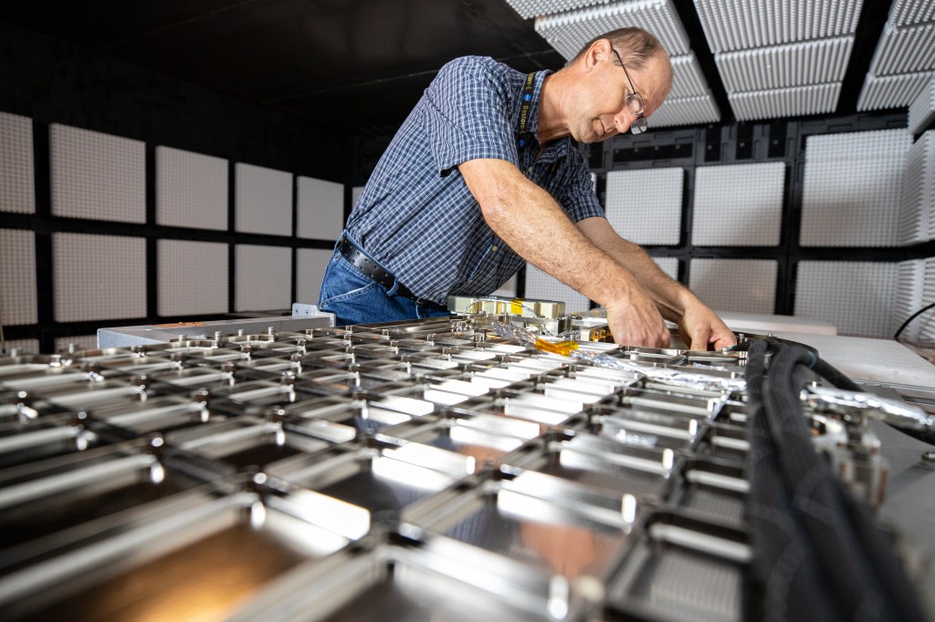 Inside the Electromagnetic Lab at NASA's Kennedy Space Center in Florida, Gabor Tamasy, Hose Management Assembly (HMA) system lead for Restore-L, prepares the HMA test unit for electromagnetic interference testing on Feb. 19, 2020. The HMA is able to extend and retract the hose, somewhat similar to the function of a tape measure. Managed by the agency's Goddard Space Flight Center in Greenbelt, Maryland, Restore-L is an inflight robotic satellite servicer spacecraft.