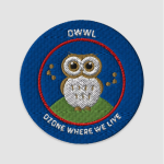 A round patch made of embroidered thread with a dark blue background and red ring. In the middle is a small green hill with a cartoon gray and white owl sitting on top, and gold molecules floating next to it. Text around the rim of the circle reads OWWL on top, and ozone where we live across the bottom.