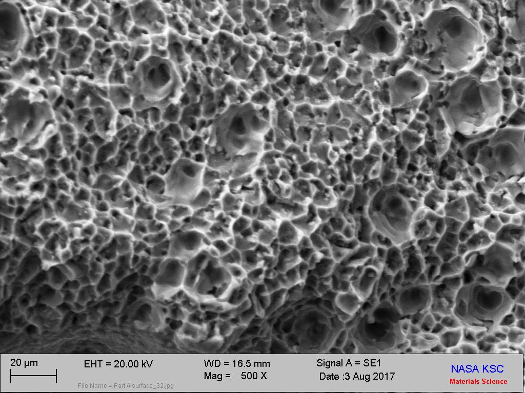 Overload Fracture Surface Showing Microvoid Coalescence