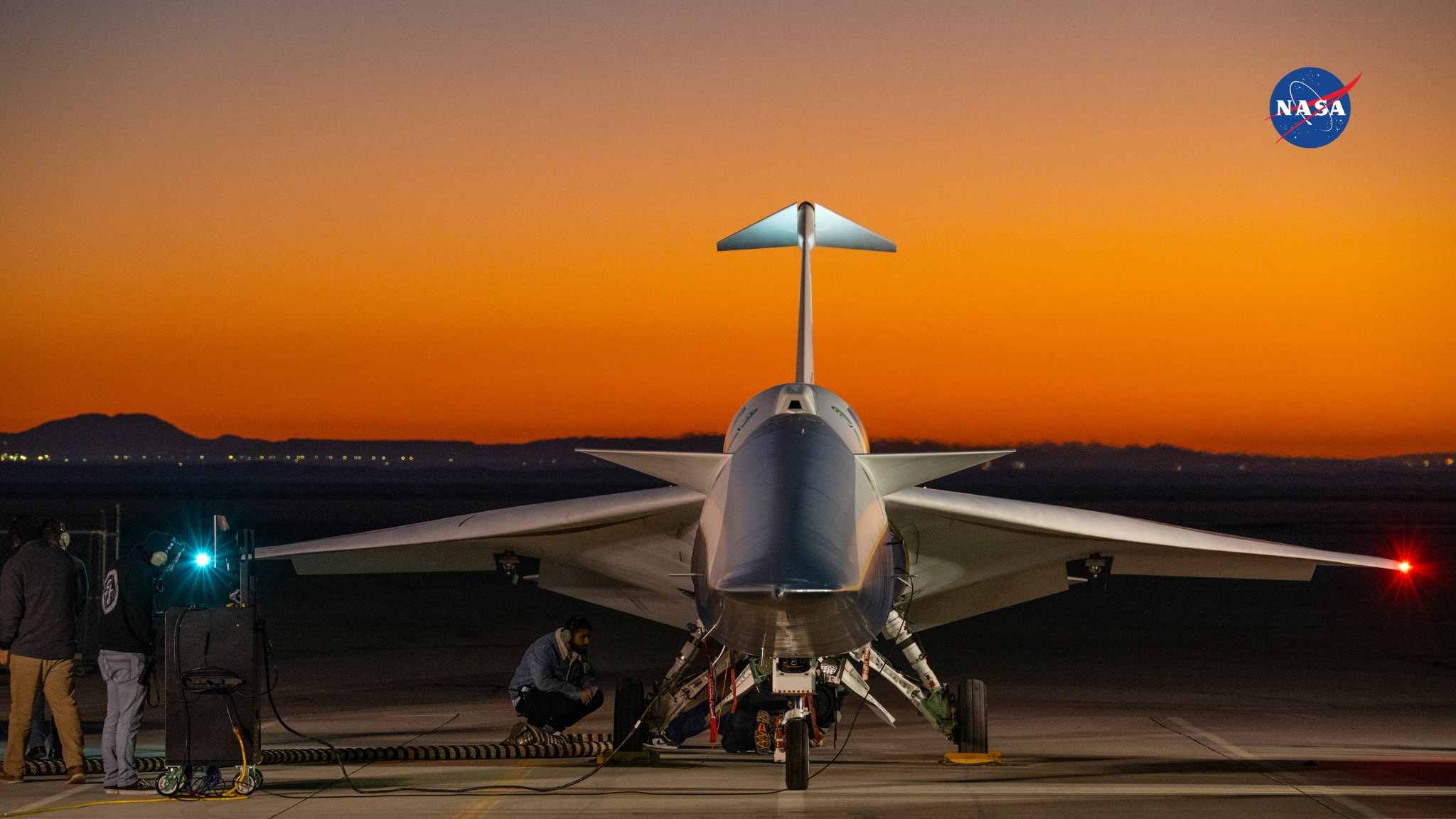 Sunrise is seen in the background as the X-59 undergoes an engine run test.