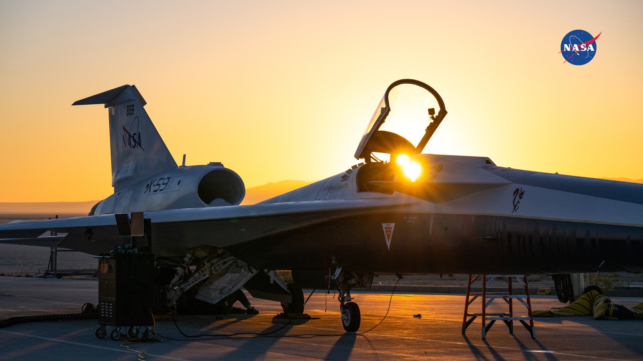 Rays of light pass through the X-59’s canopy during an engine run test.