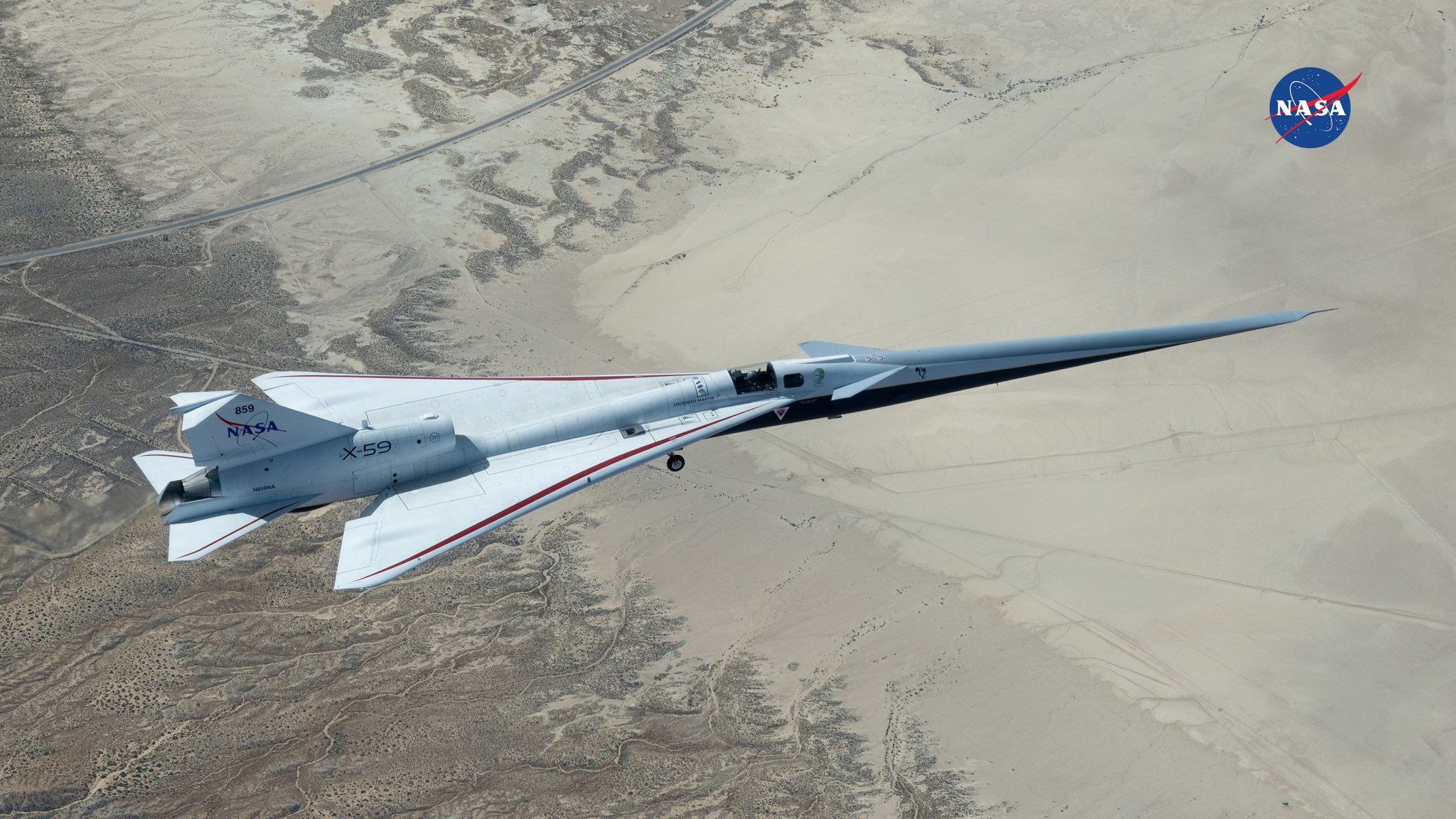 NASA’s X-59 flies above Rogers Dry Lakebed.