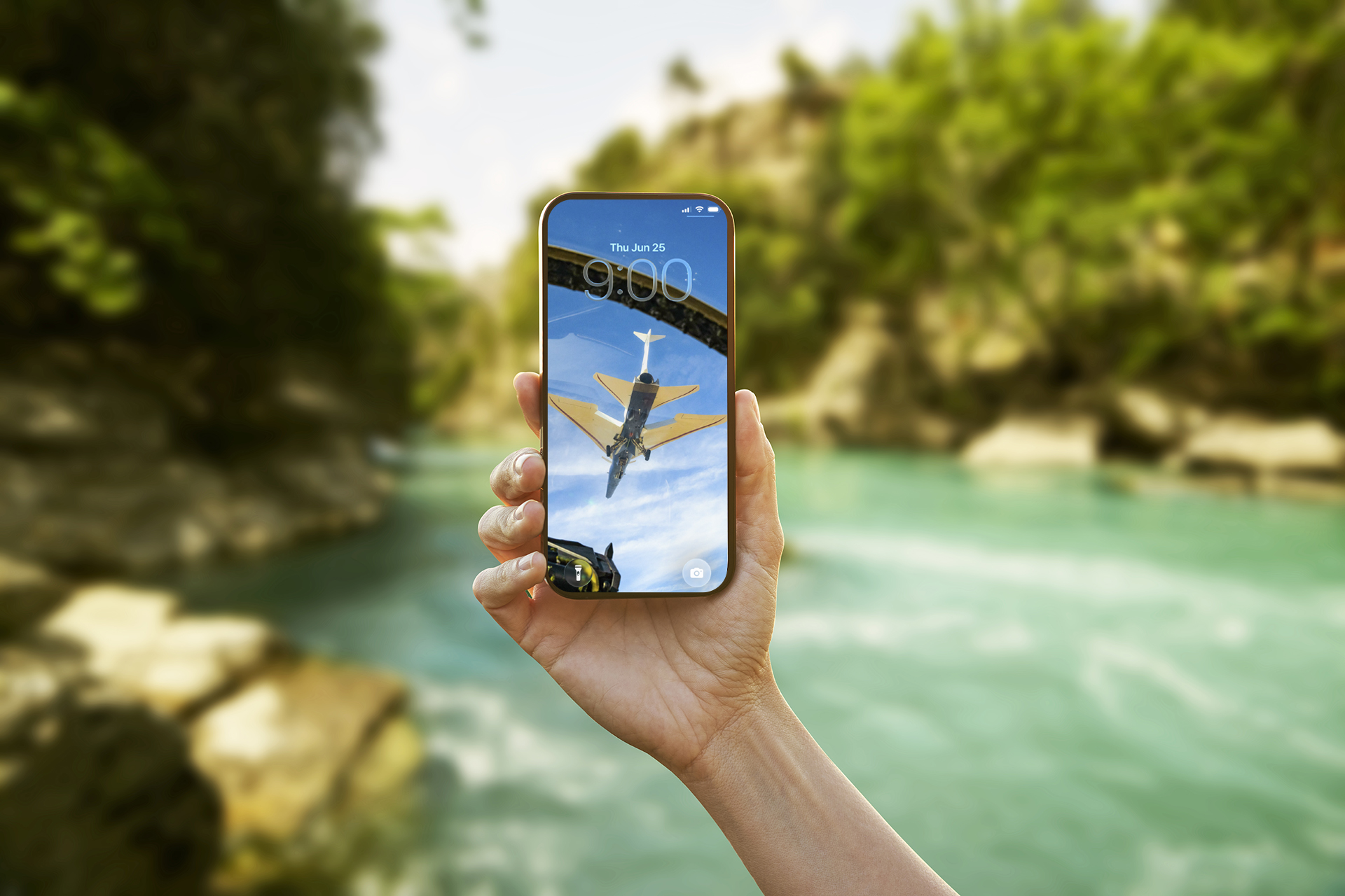 A hand holding up a cellular phone with the new X-59 digital backgrounds as the wallpaper.