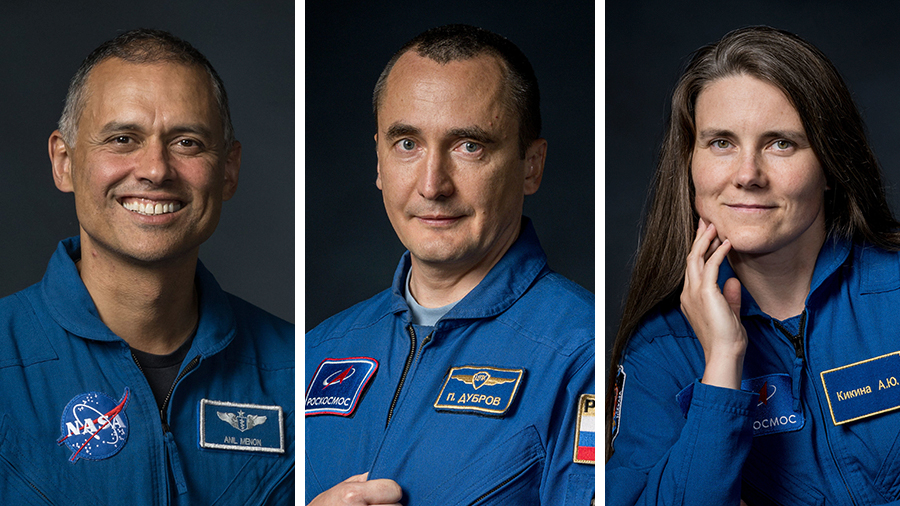 From left, NASA astronaut Anil Menon and Roscosmos cosmonauts Pyotr Dubrov and Anna Kikina will launch aboard the Soyuz MS-29 spacecraft from the Baikonur Cosmodrome in Kazakhstan to the International Space Station.