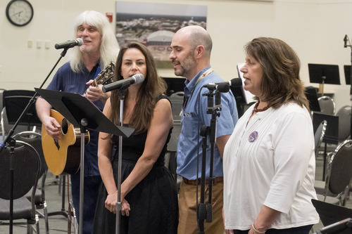 Left to right: Guest artist Karl Werne performs with NASA Langley's Lena Pascale, xxx, and Kelly Murphy.