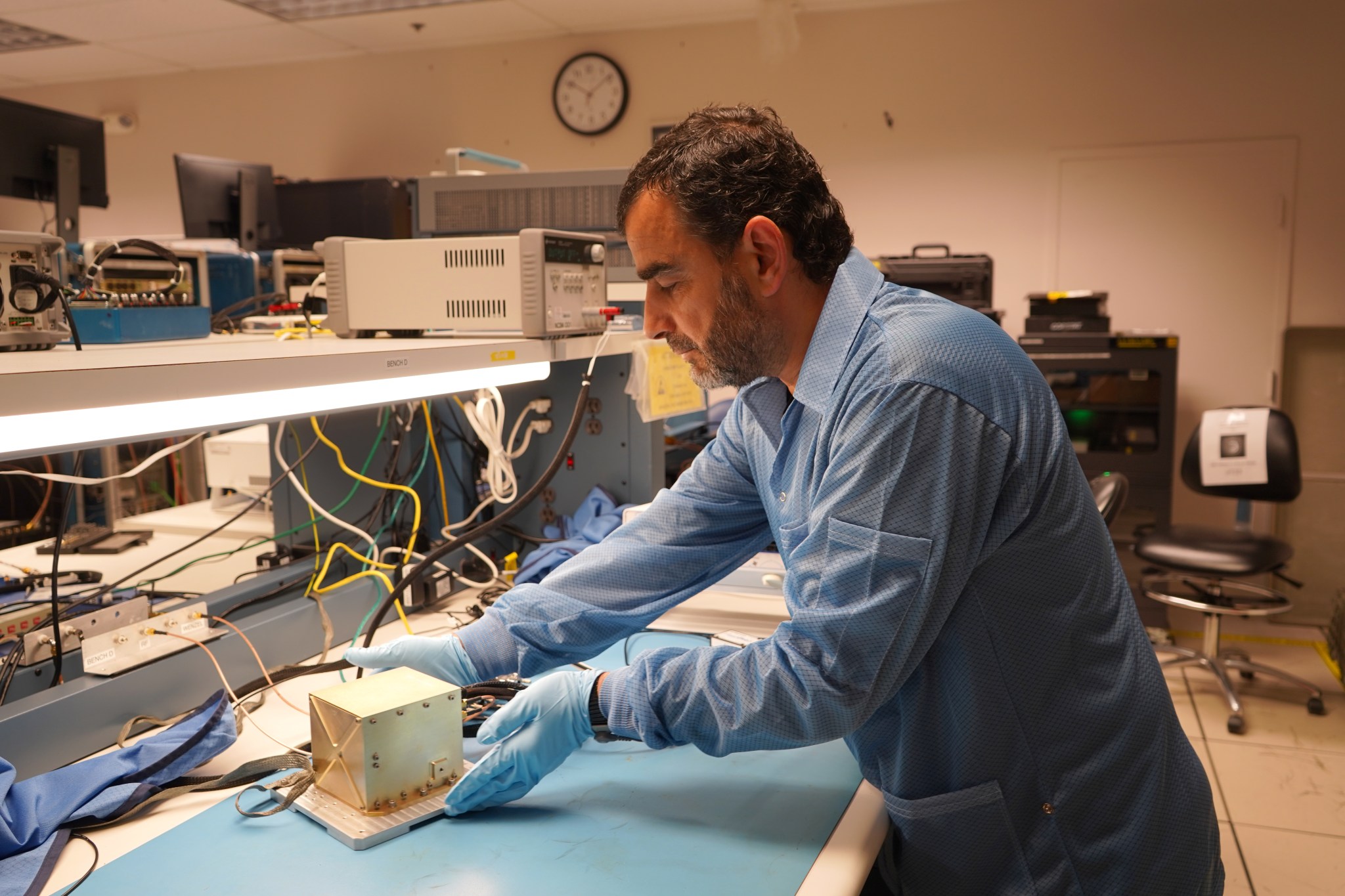 The NavCube3-mini payload and project manager in a laboratory at NASA's Goddard Space Flight Center in Greenbelt, Md.