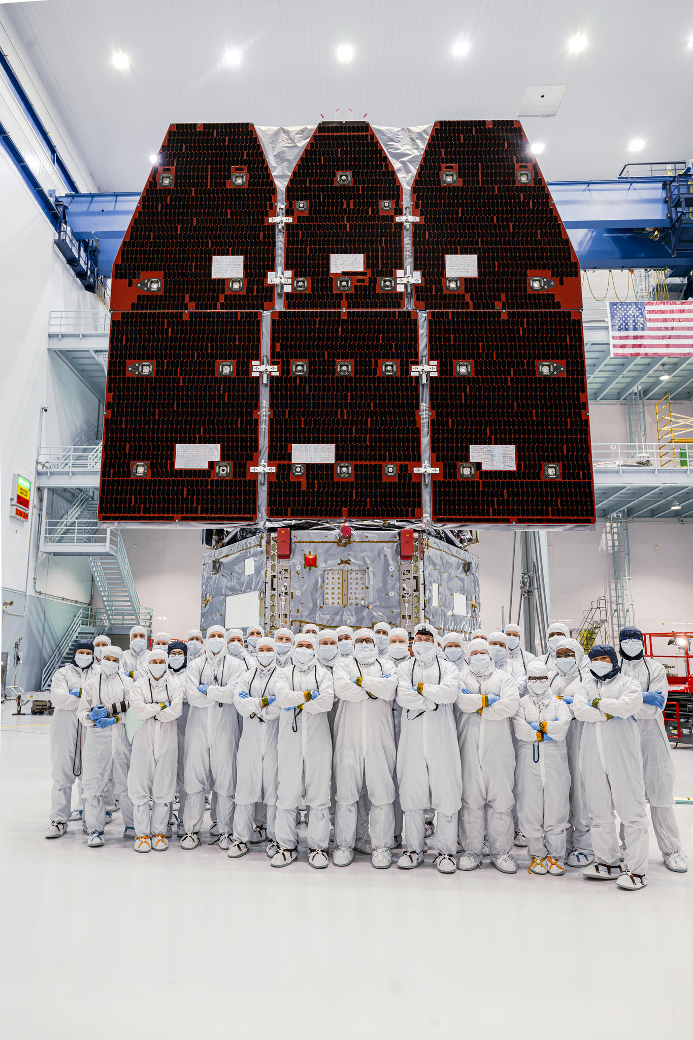 A large group of technicians in white