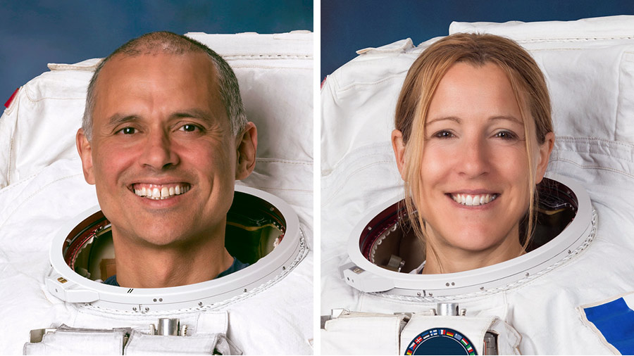 Astronauts Anil Menon of NASA and Sophie Adenot of ESA pose for their official portraits while wearing spacesuits at the Johnson Space Center in Houston, Texas.