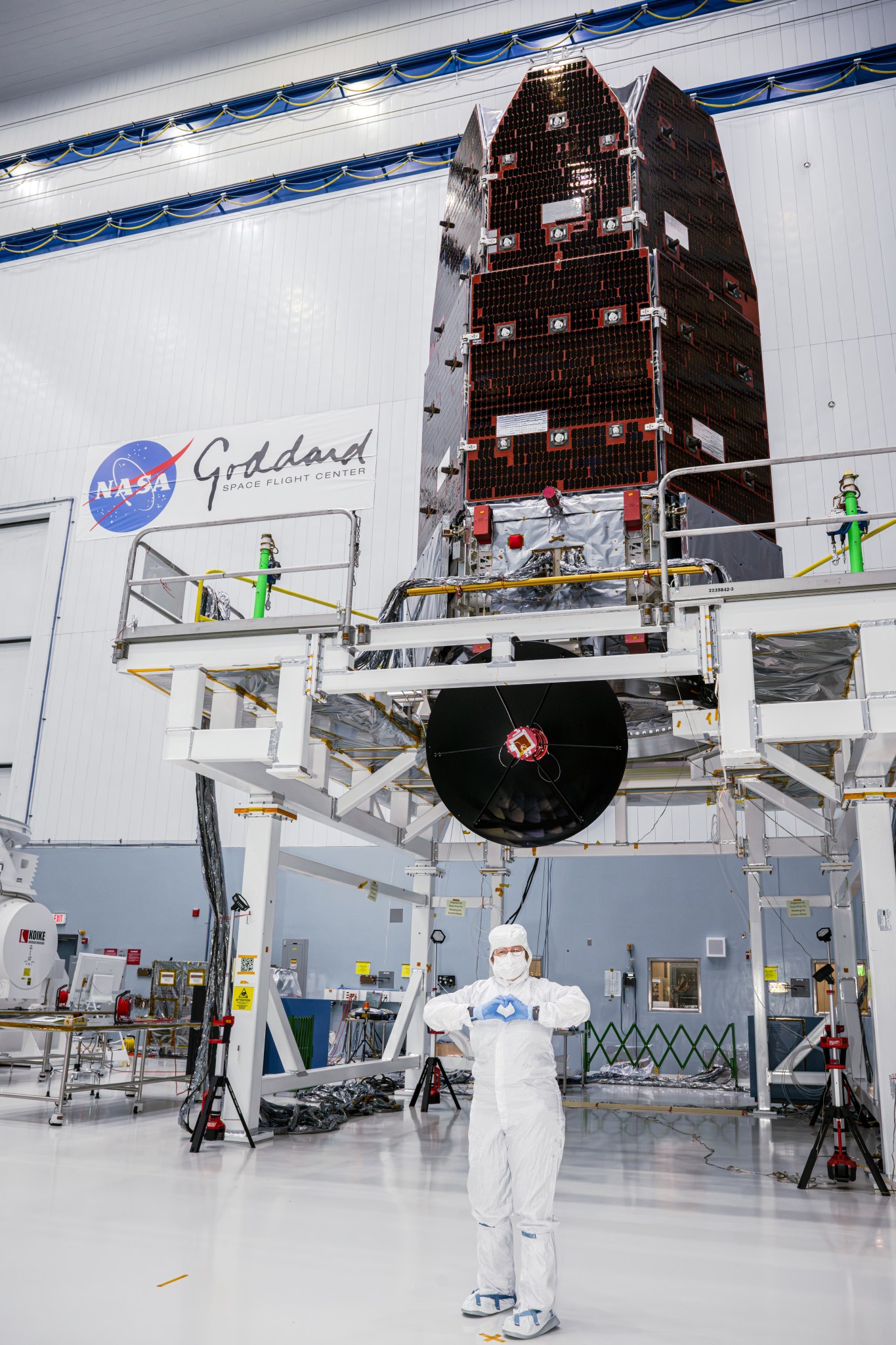 Julie McEnery and Roman Space Telescope in a clean room