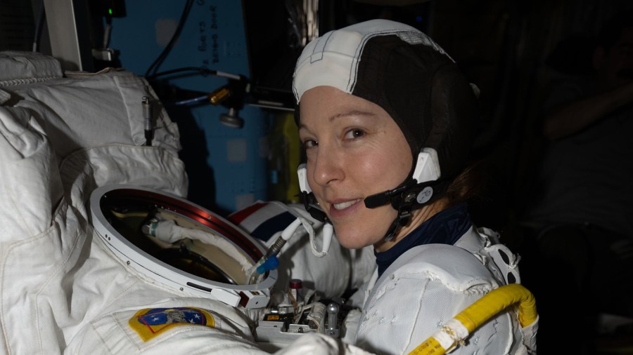 ESA astronaut Sophie Adenot tries on a spacesuit to verify its comfort, mobility, and functionality inside the International Space Station's Quest.