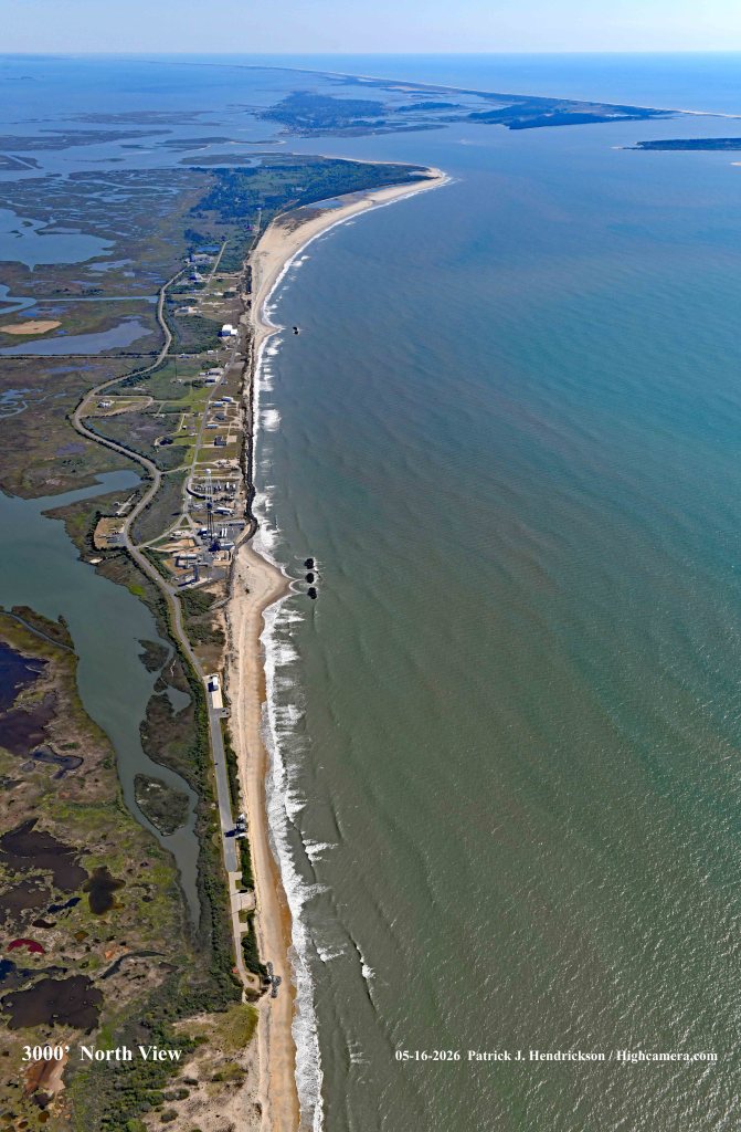 Aerial view of Wallops Island in May 2026 showing sand accretion at breakwaters and erosion in the center of the island.