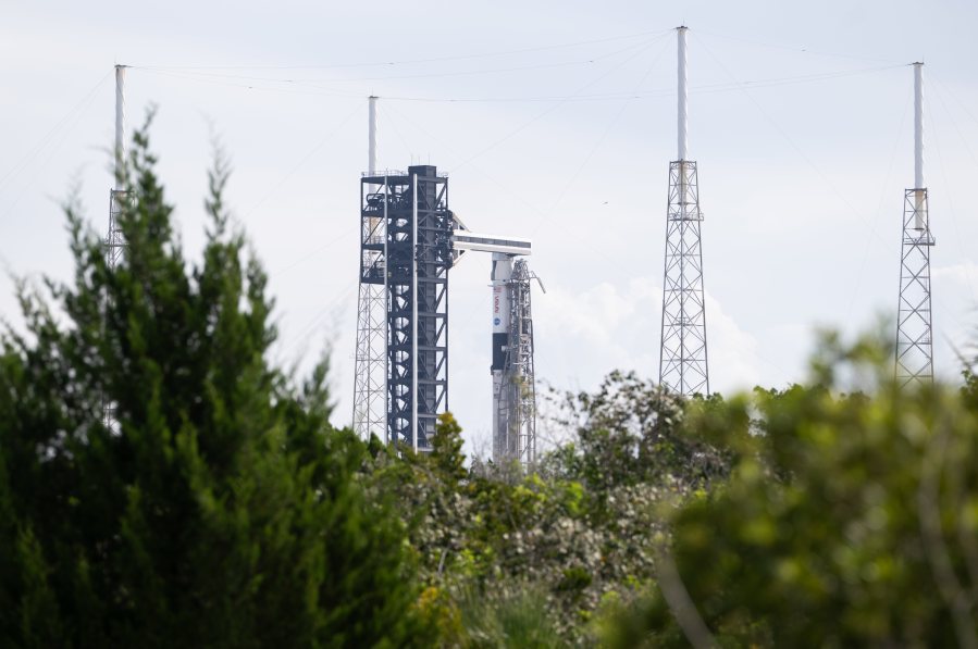 A SpaceX Falcon 9 rocket with the company's Dragon spacecraft on top is seen on the launch pad at Space Launch Complex 40 as preparations continue for the Crew-13 mission, Wednesday, Sept. 30, 2026, at Cape Canaveral Space Force Station in Florida.
