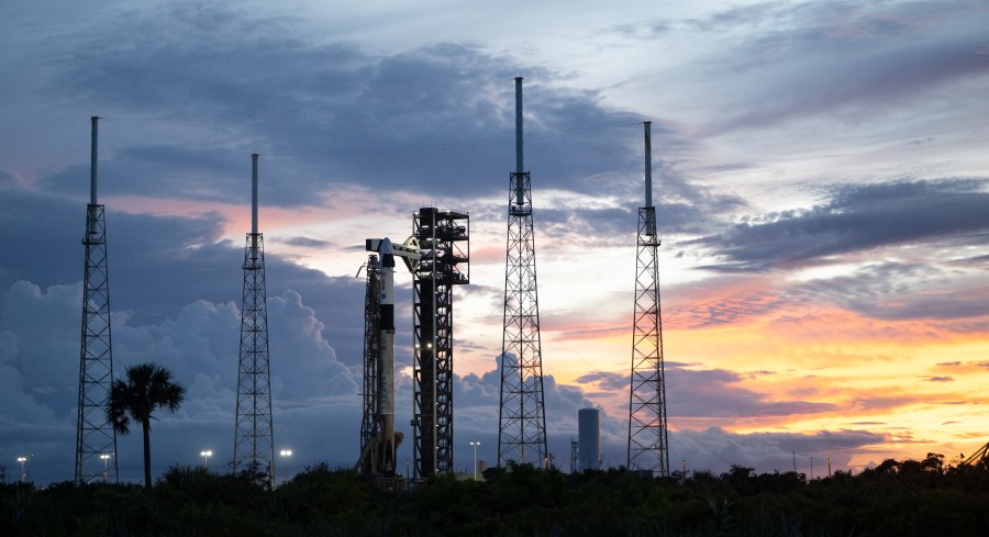 Rocket on the launch pad at sunset.