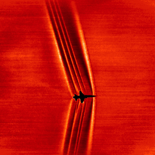 Image of an Air Force Test Pilot School T-38 sonic boom shockwaves