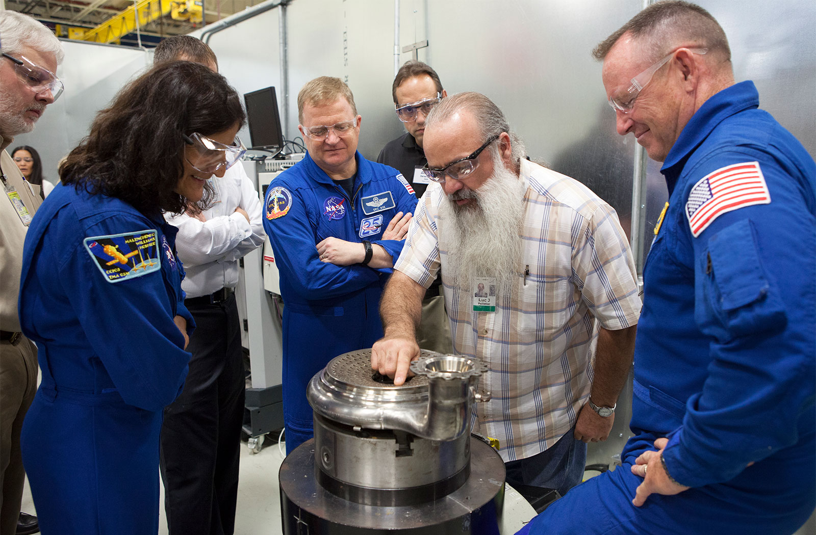 NASA astronauts Suni Williams, from left, Eric Boe and Barry 