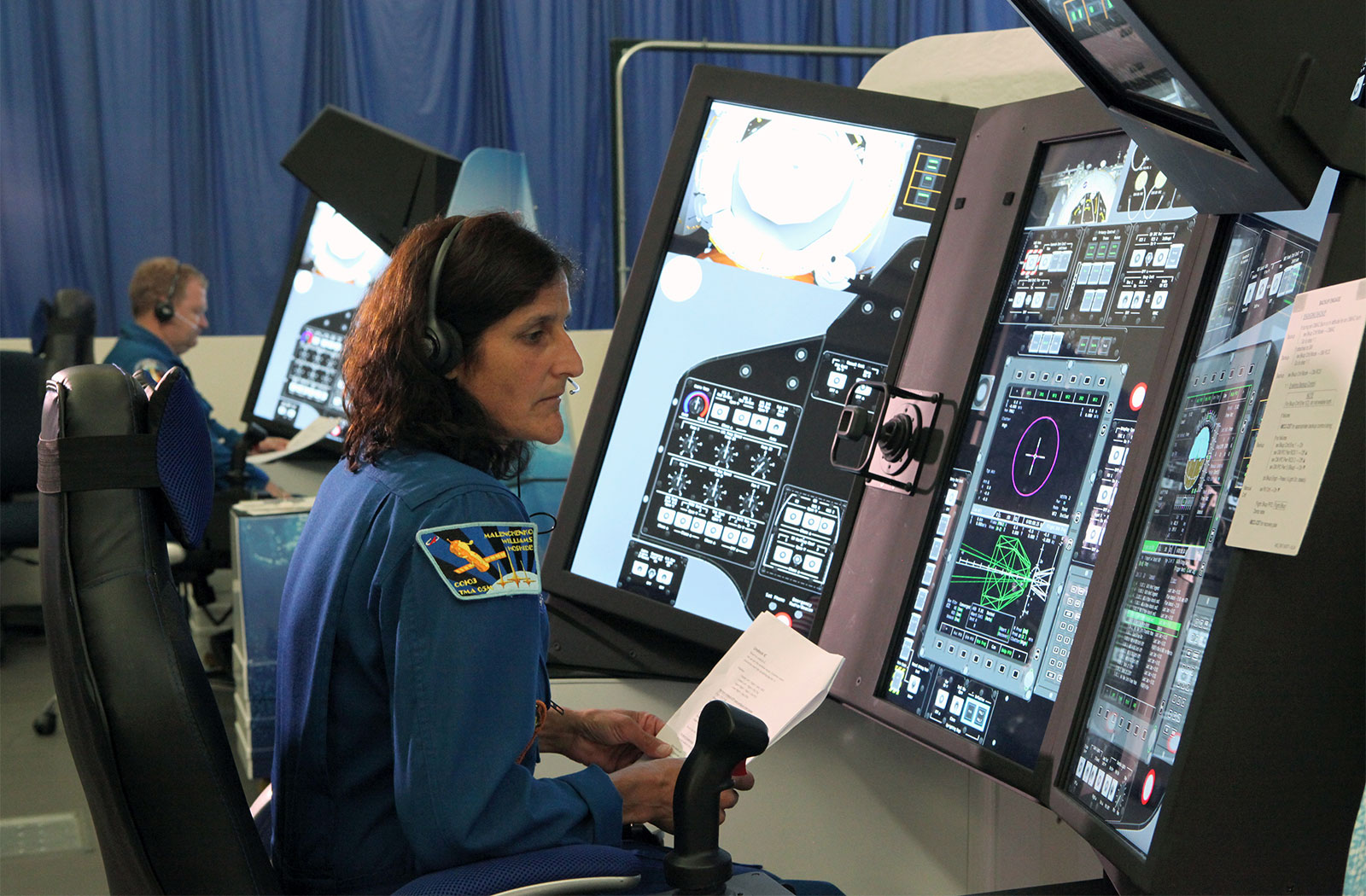 Suni Williams and Eric Boe practice docking operations for Boeing's CST-100 Starliner.